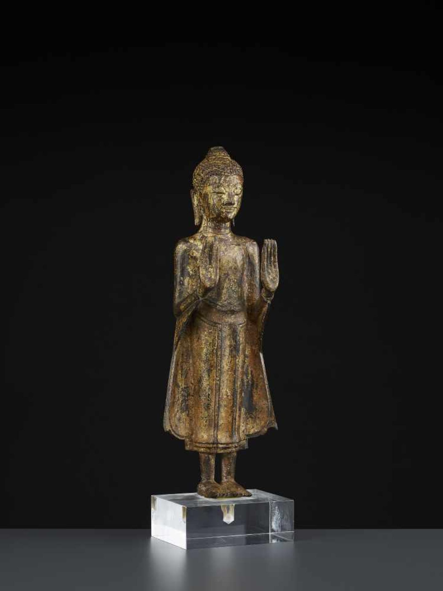 BUDDHA SHAKYAMUNI 17TH CENTURY Thailand, Ayutthaya period. The bronze statue with rich gold-