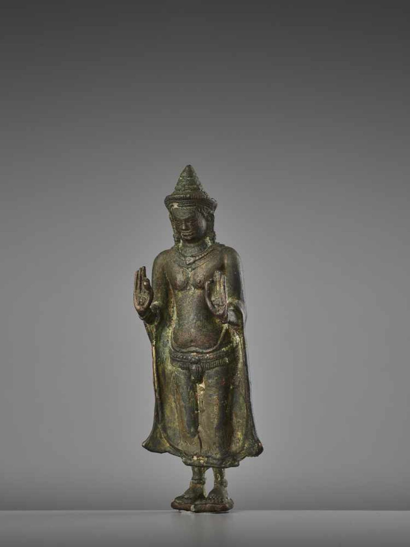 A KHMER LOPBURI BRONZE BUDDHAThailand, 13th century. The neatly cast figure with fine incisions - Image 2 of 8