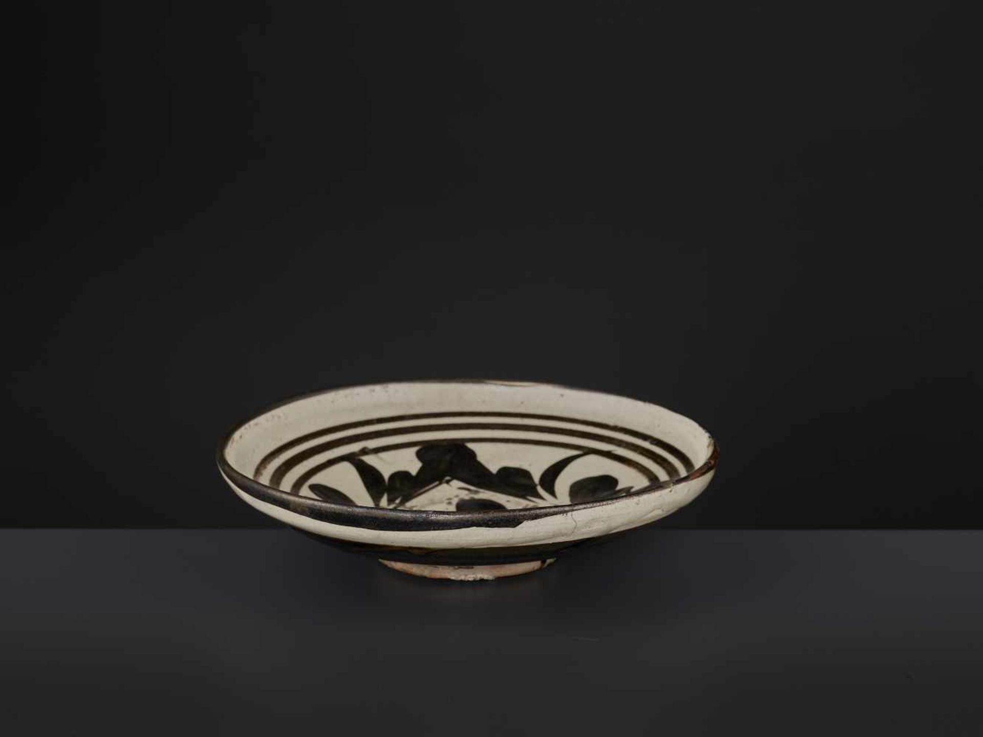 A PAINTED CIZHOU BOWL, SONG DYNASTYChina, Song dynasty (960-1279). The creamy-white glaze painted in - Image 9 of 10