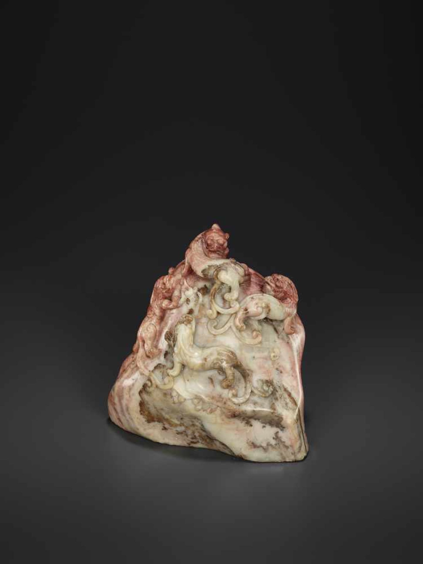 A SOAPSTONE CHILONG MOUNTAIN, QINGChina, 1750-1850. An inspiring work depicting four Chilong