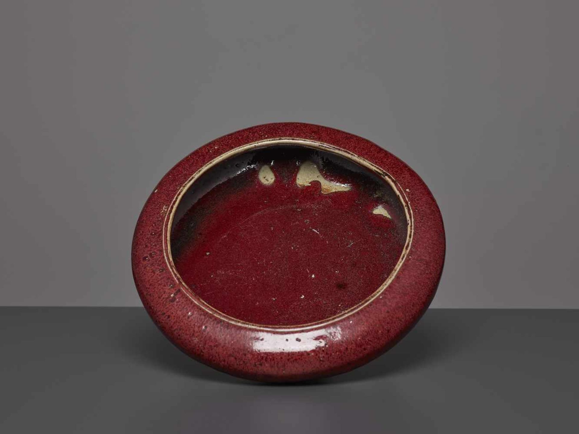 A LANGYAO CERAMIC BOWL, QING DYNASTYChina, 18th - 19th century. Vitreous deep-red glaze, featuring - Image 3 of 6