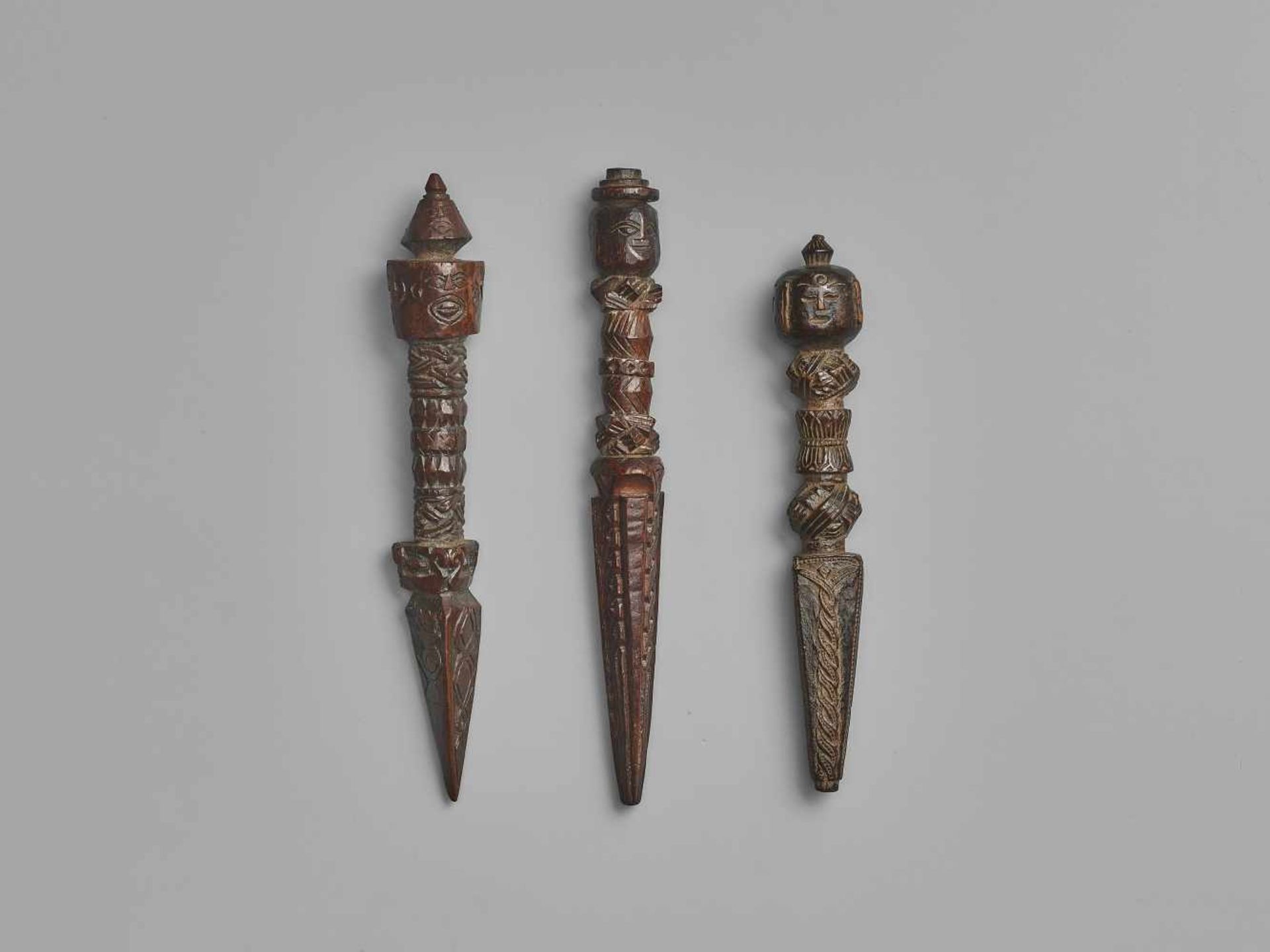 THREE NEPALESE CARVED WOOD PHURBUS Nepal, 17th-19th century. This lot comprises three phurbus, - Image 2 of 6