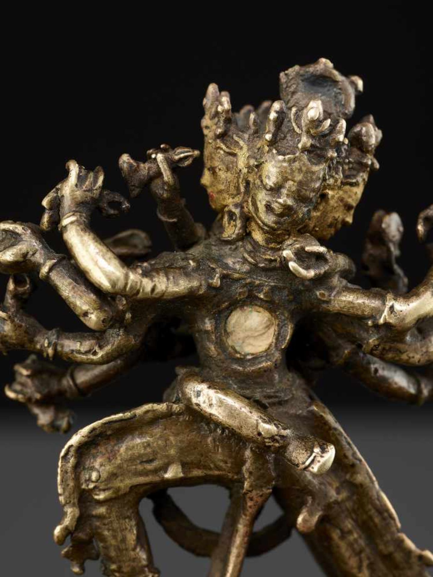 A CAKRASAMVARA BRONZE 17TH CENTURY Nepal. The four-headed and twelve-armed Cakrasamvara entangled by - Image 3 of 15