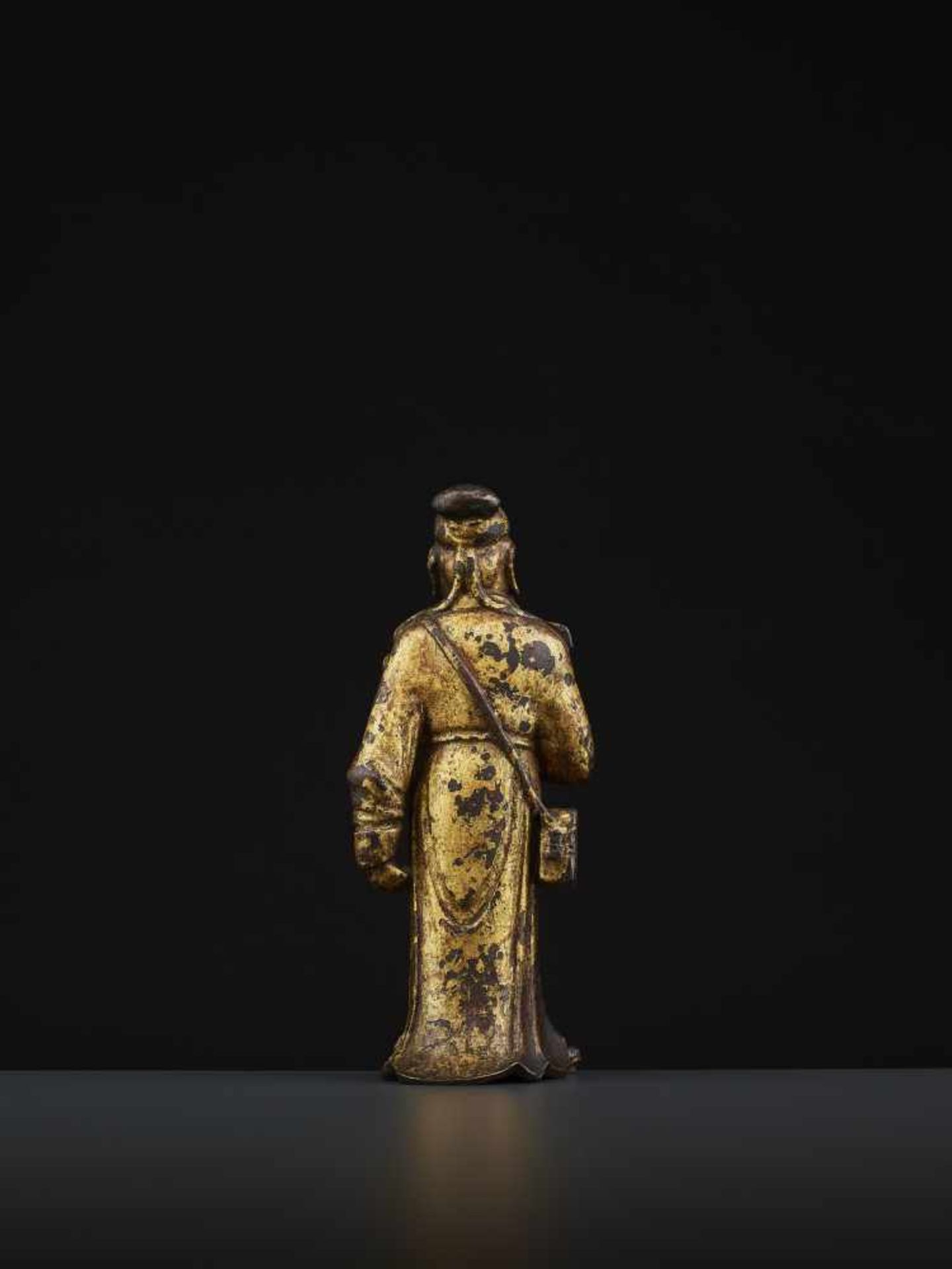 A MING DAOIST IMMORTAL BRONZEChina 16th - 17th century. The bronze with a rich gold lacquer coating. - Image 5 of 10