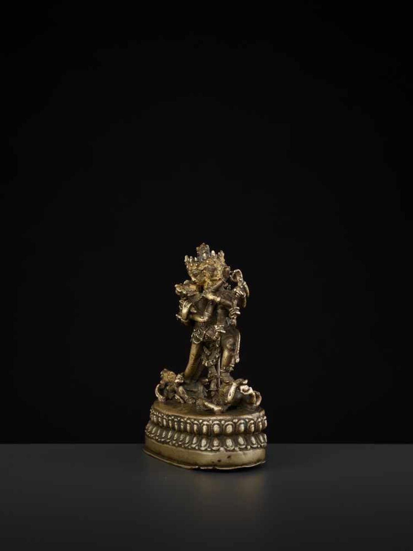 A CAKRASAMVARA BRONZE 17TH CENTURY Nepal. The four-headed and twelve-armed Cakrasamvara entangled by - Image 7 of 15