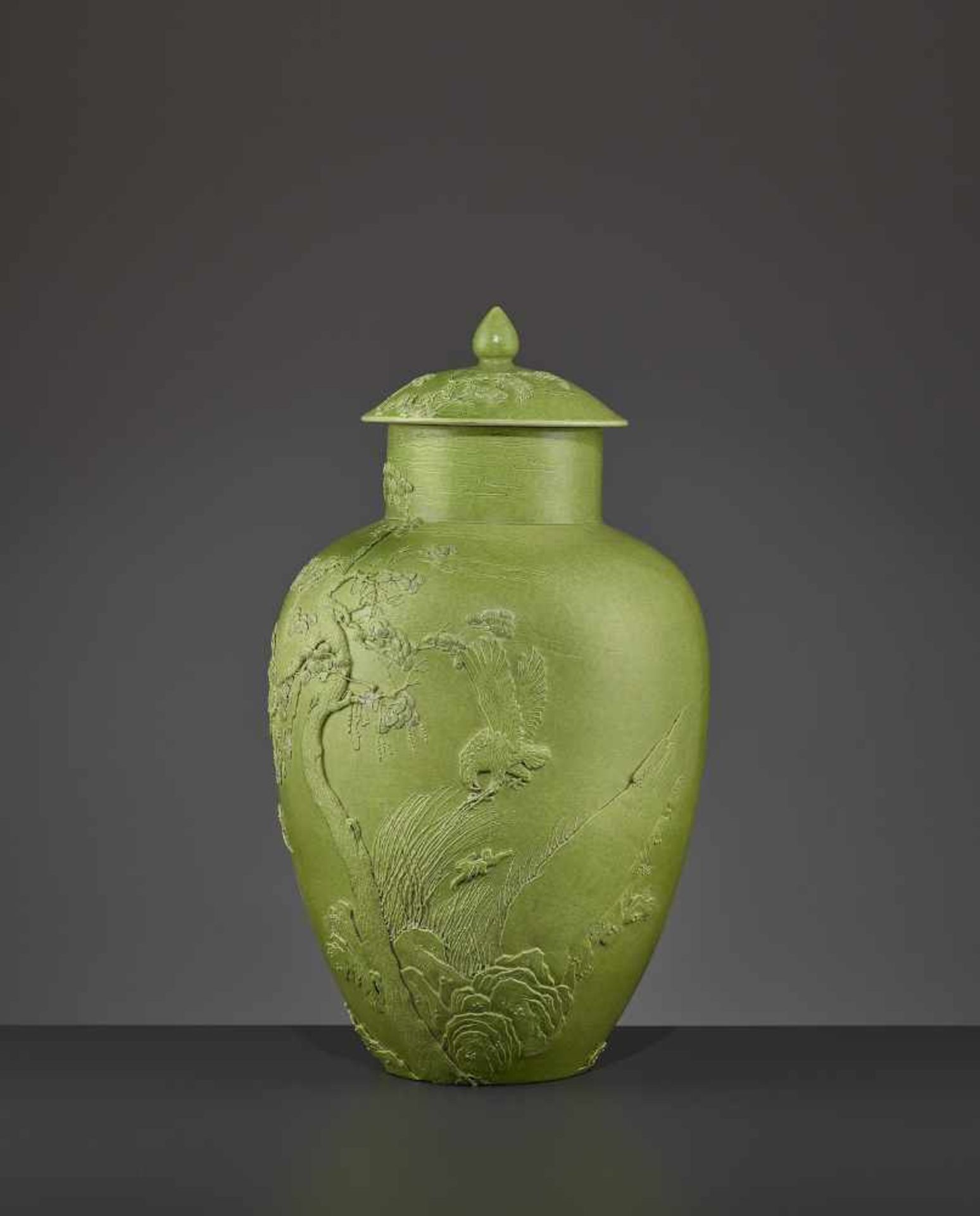 A VASE BY WANG BINGRONG (1840-1900)China. The lidded vessel with a striking lime-green glaze. Molded