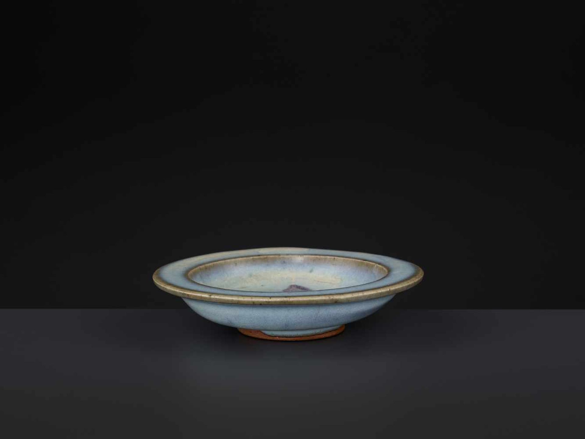 A JUNYAO DISH, SONG DYNASTYChina, 12th-13th century. Finely potted with shallow sides and a - Image 5 of 8