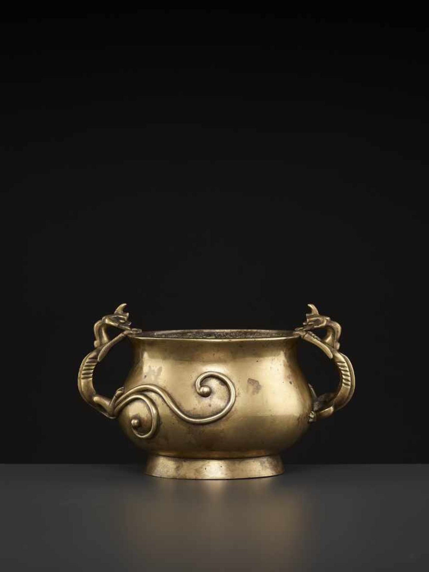 A LARGE CHILONG BRONZE CENSER, QINGChina, 1780-1880. The massive vessel raised from a sprawling foot - Image 3 of 8