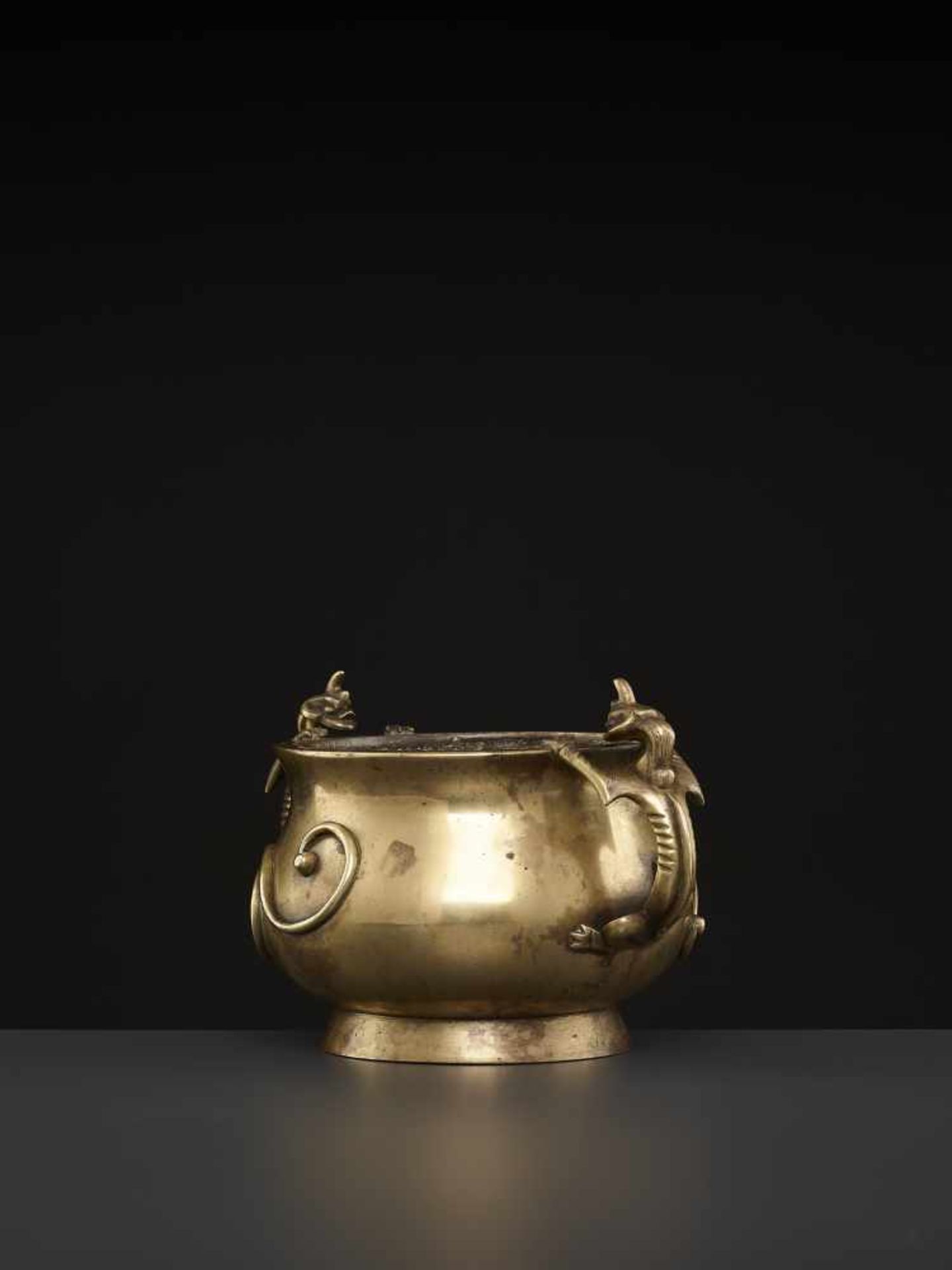 A LARGE CHILONG BRONZE CENSER, QINGChina, 1780-1880. The massive vessel raised from a sprawling foot - Image 4 of 8