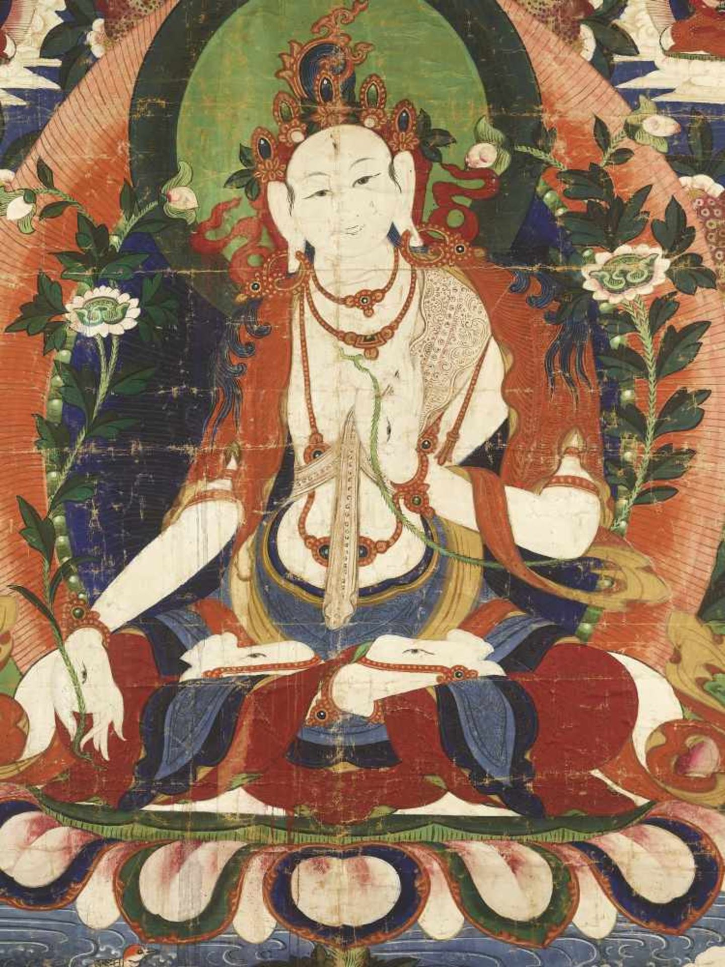 A LARGE SITATARA THANGKA 19TH CENTURYHimalayan. Depiction of the white seven-eyed tara seated on a - Image 2 of 4