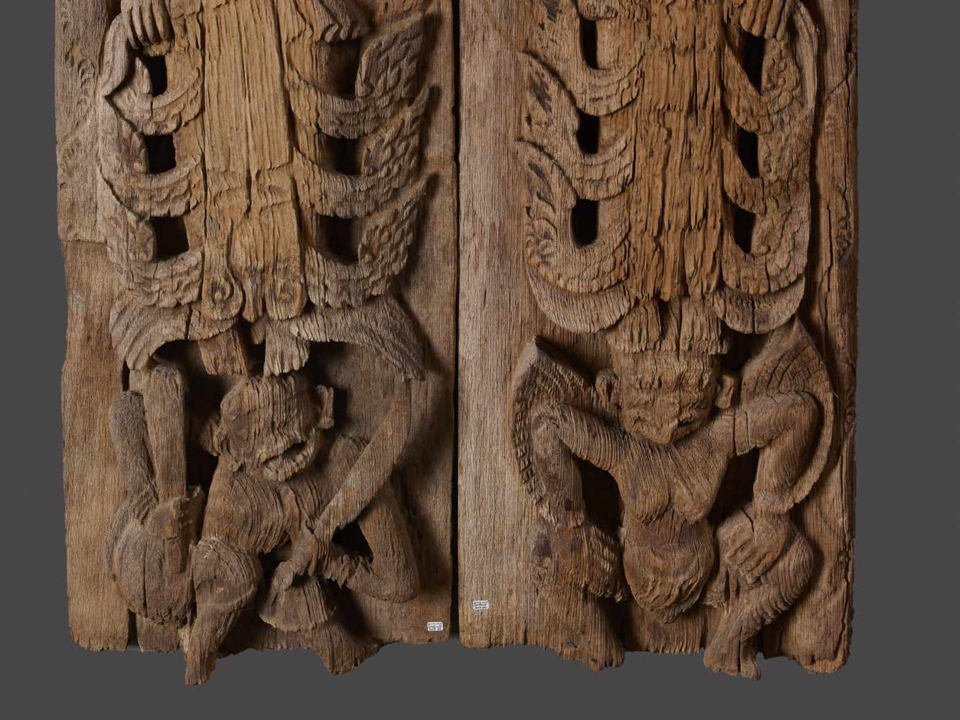 A PAIR OF BURMESE TEMPLE DOORSBurma / Myanmar, 18th - 19th century. Carved teak wood. Each with - Image 3 of 7