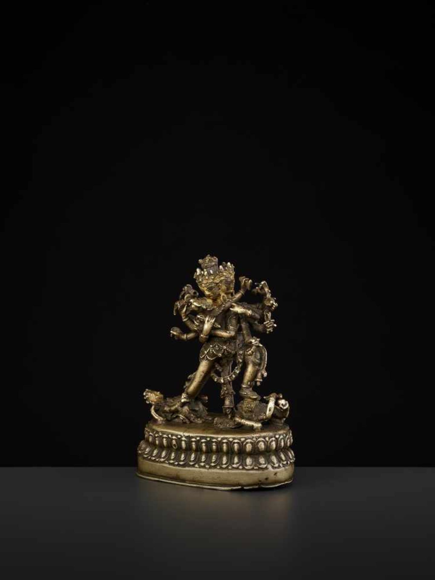 A CAKRASAMVARA BRONZE 17TH CENTURY Nepal. The four-headed and twelve-armed Cakrasamvara entangled by - Image 6 of 15