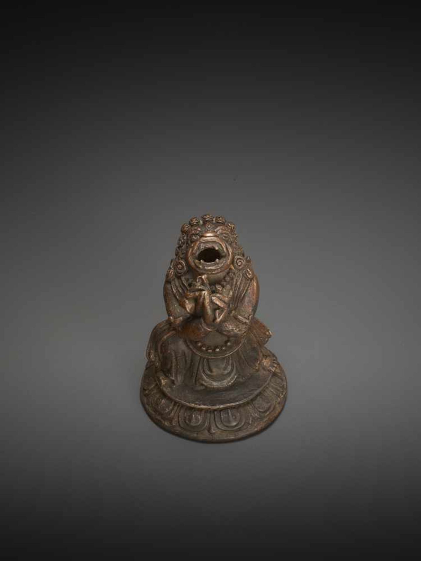 A WRATHFUL TANTRIC DEITY 17TH CENTURYA remarkable Tibetan copper bronze of a wrathful deity