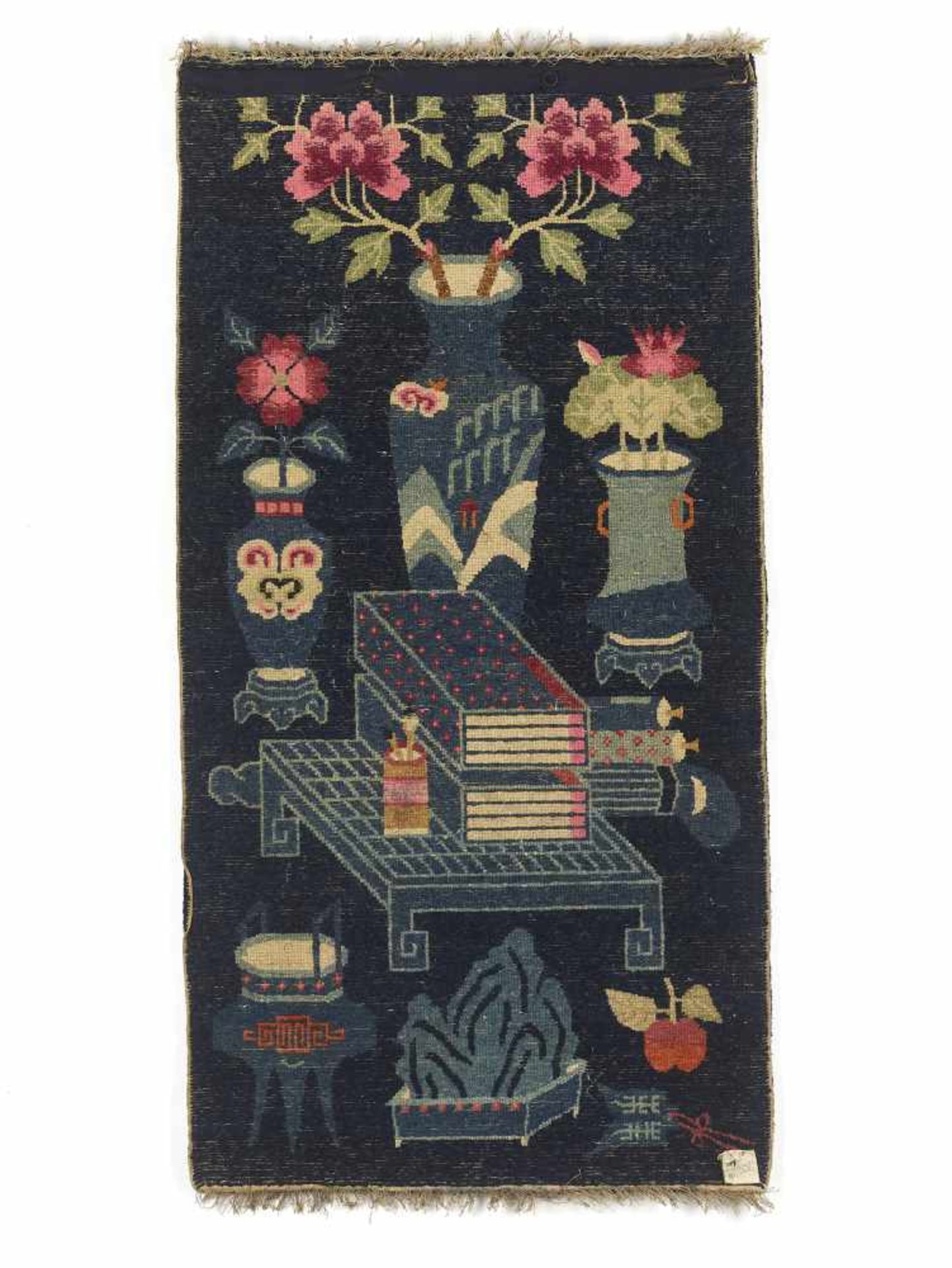 A SMALL NINGXIA RUG, QINGChina, 19th century. Finely woven wool rug with a palace still life showing - Image 4 of 4