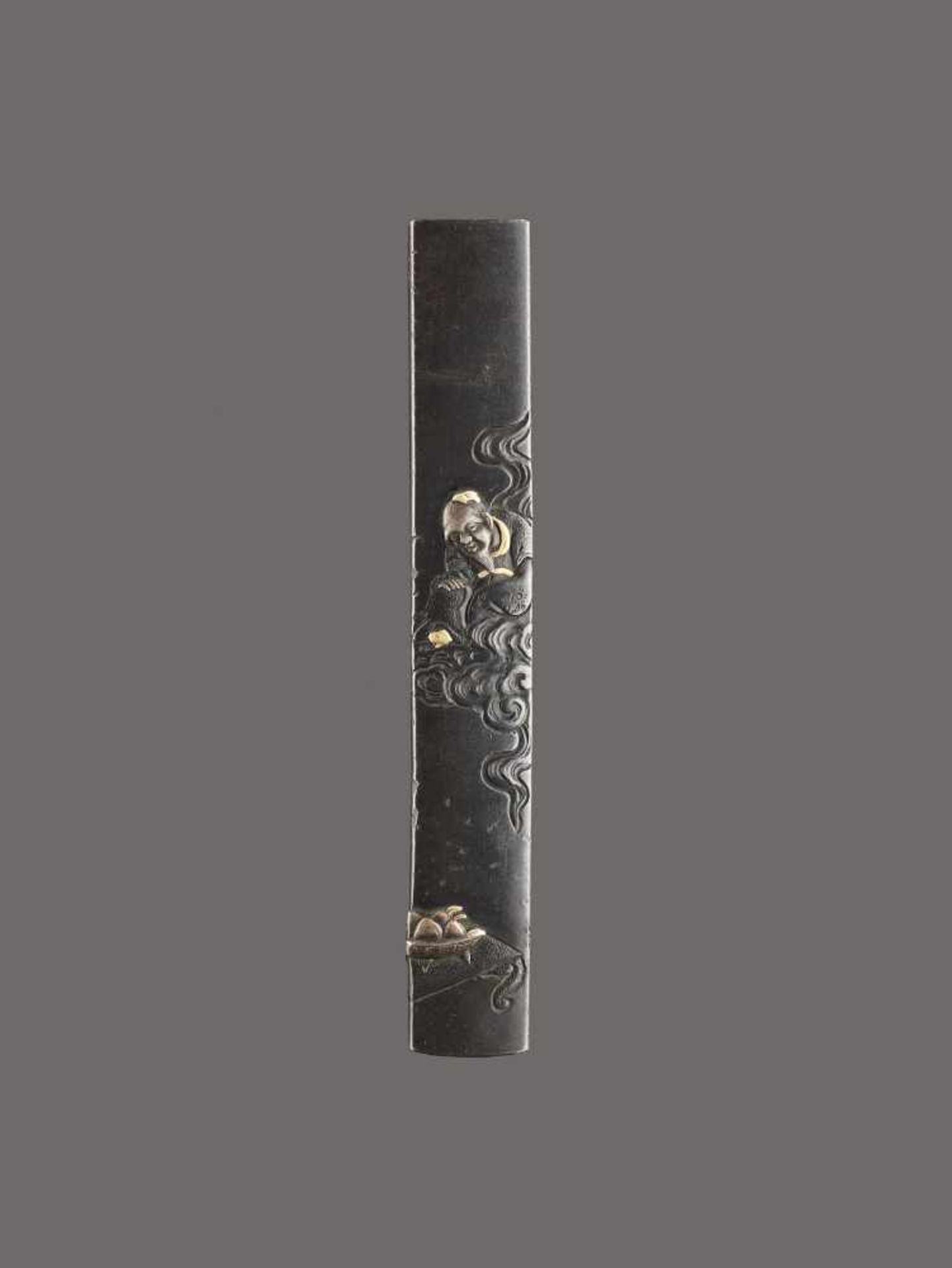 A SHAKUDO KOZUKA HANDLE OF A TAOIST MAGICIAN ON A CLOUD BY KATSUYUKI By Terumitsu, kozuka handle,