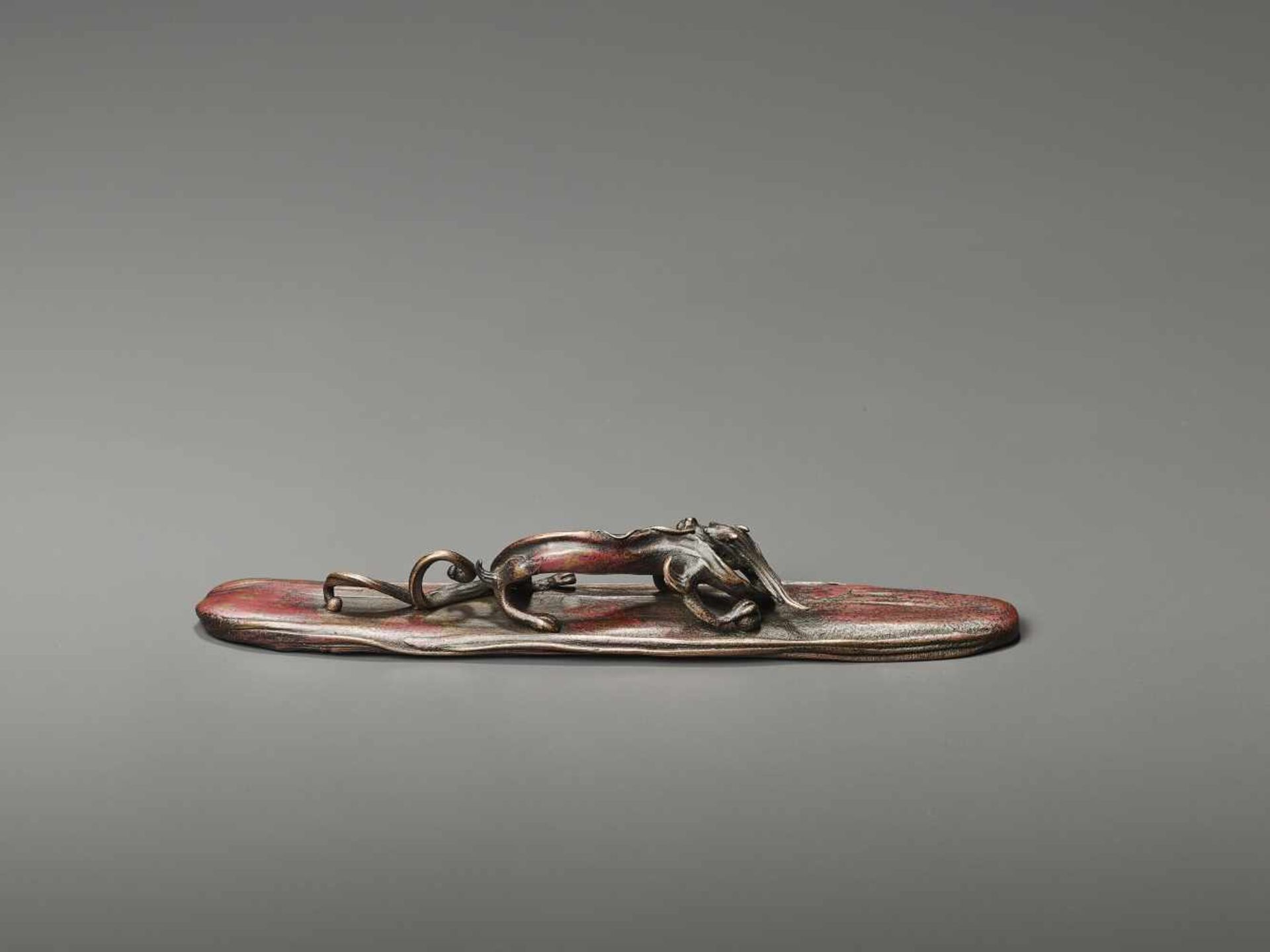 A BRONZE SCROLL WEIGHT BY TAKUSAI  Japan, Meiji period (1868-1912). Artist seal of Honma Takusai III - Image 8 of 11