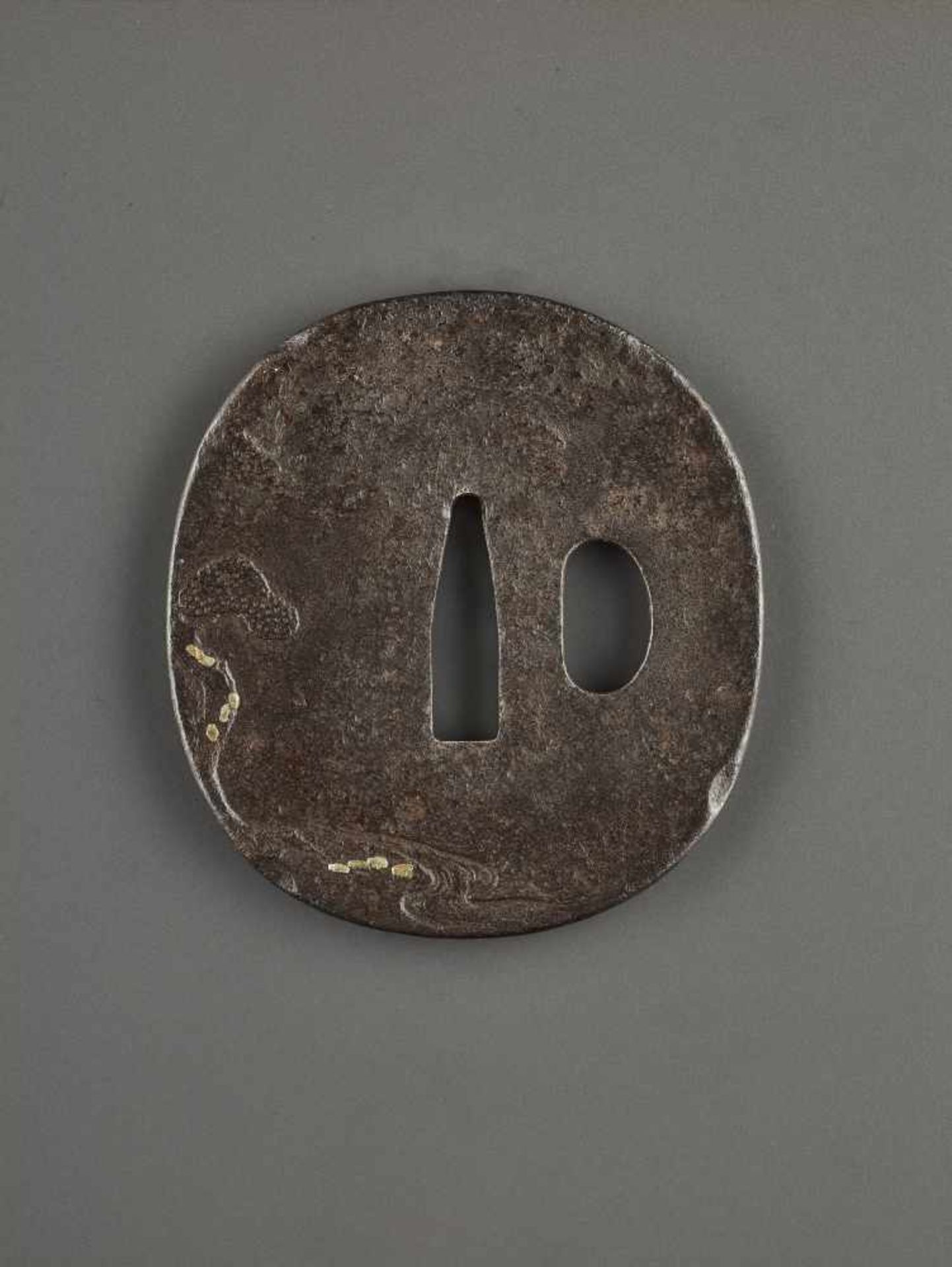 A FINE IRON TSUBA WITH SARUMAWASHI Iron with gold and copperJapan, Edo period (1615-1868)Of Naga - Image 3 of 3