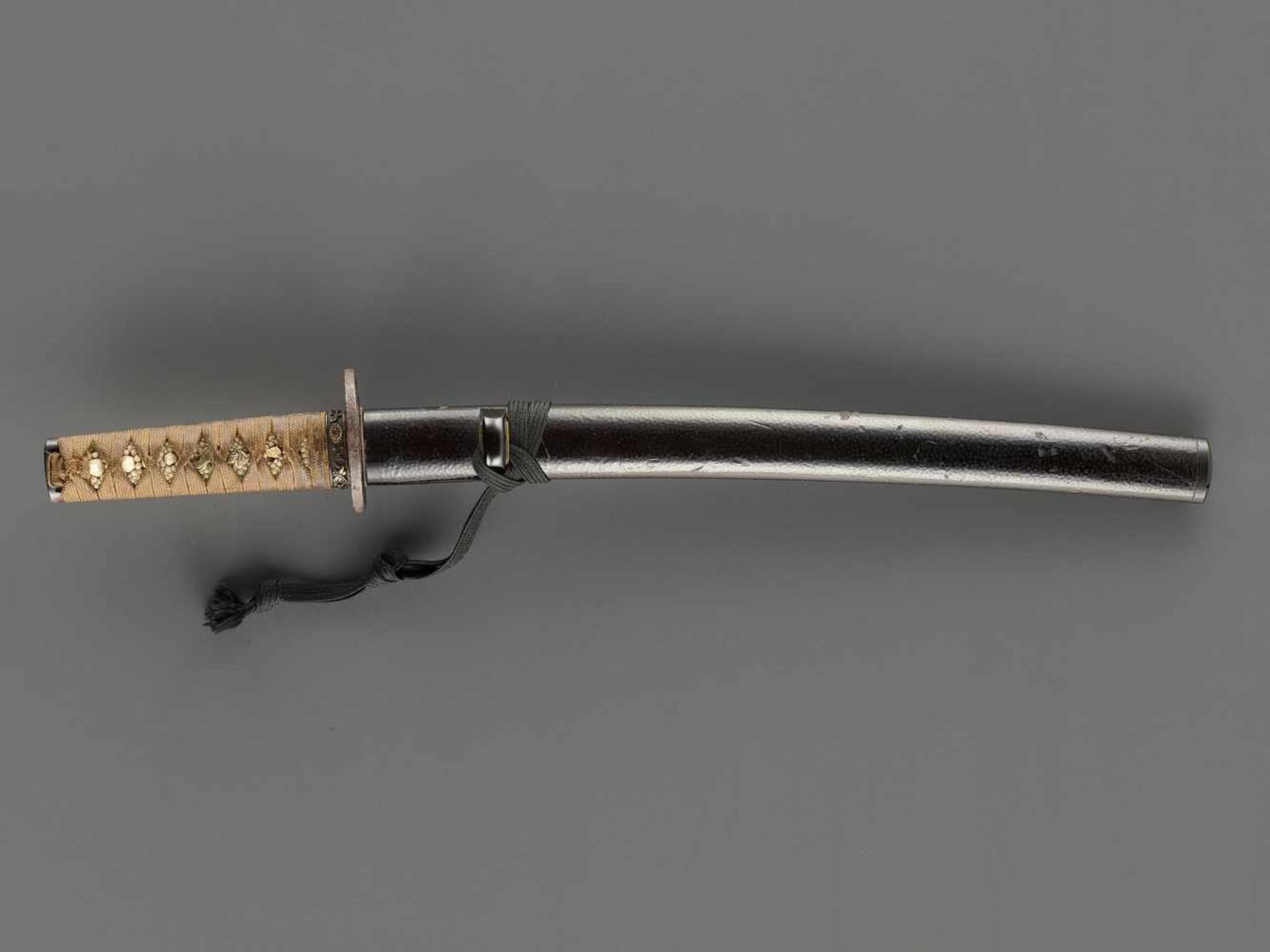 A TANTO IN KOSHIRAE Japan, c. mid-Edo period (1615-1868)The blade:Hirazukuri with iori mune, the