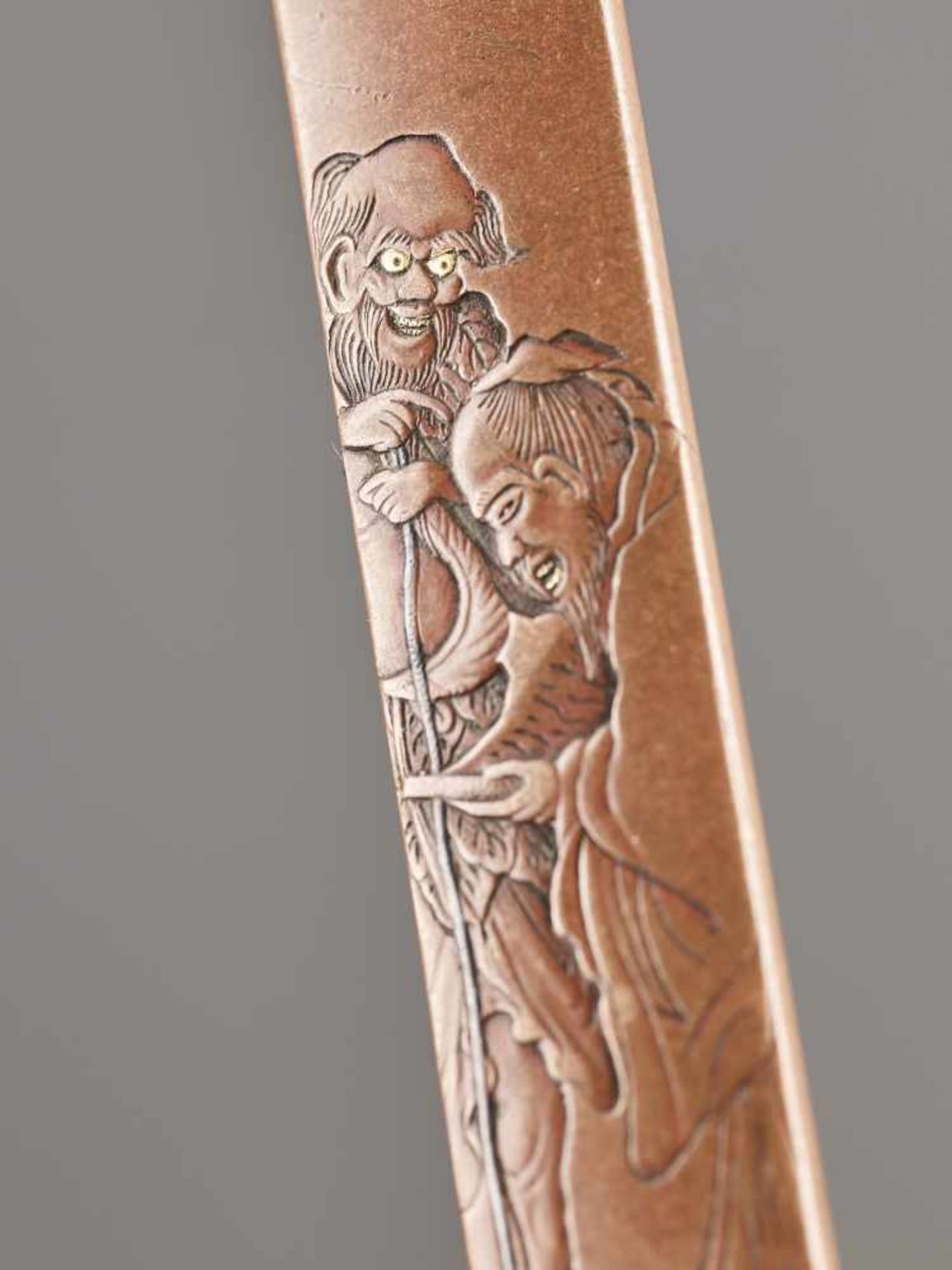 A COPPER KOZUKA HANDLE OF TWO IMMORTALS BY NAOYUKI By Naoyuki, kozuka handle, copper and some gold - Image 3 of 4