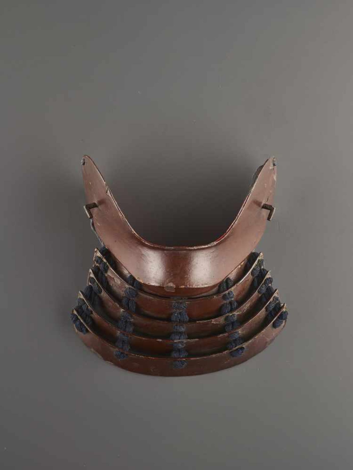 A HANBO (MASK) Lacquered iron with fabricJapan, Edo period (1615-1868)Covering the lower face from