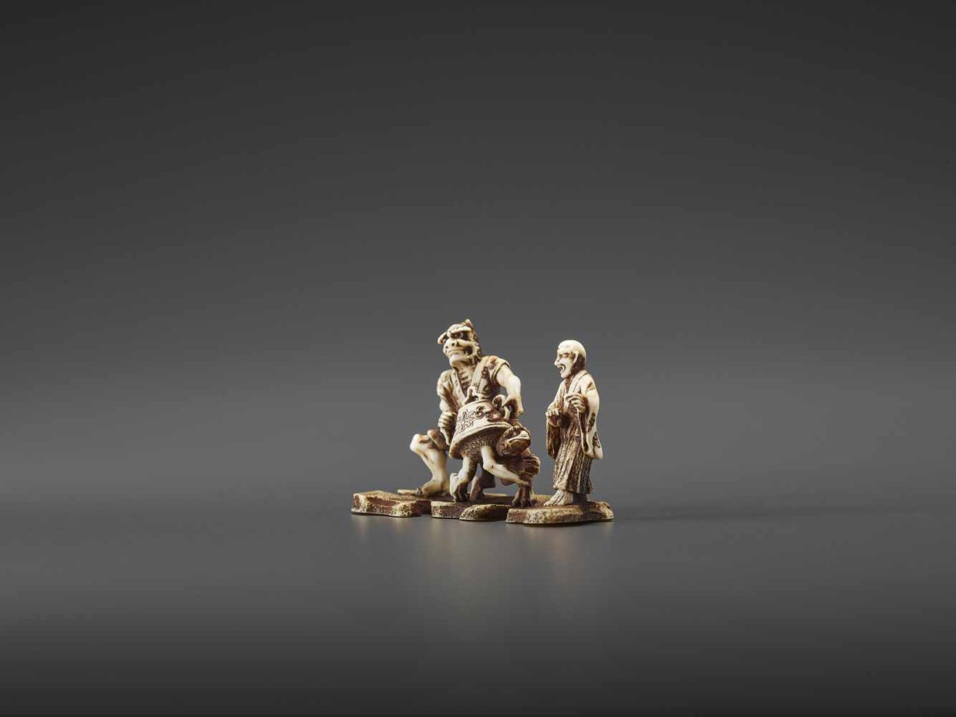 A MINUTELY CARVED IVORY NETSUKE OF ONI, KAPPA AND MONK SIGNED TENMIN Signed Tenmin, ivory - Image 3 of 10