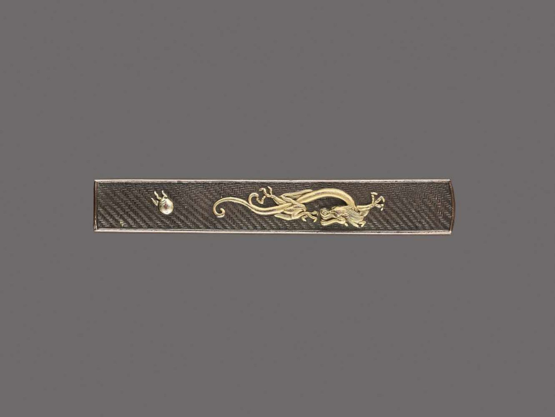 A FINE SHAKUDO KOZUKA HANDLE DEPICTING A GOLD DRAGON BY HIDETOMO By Hidetomo, kozuka handle,