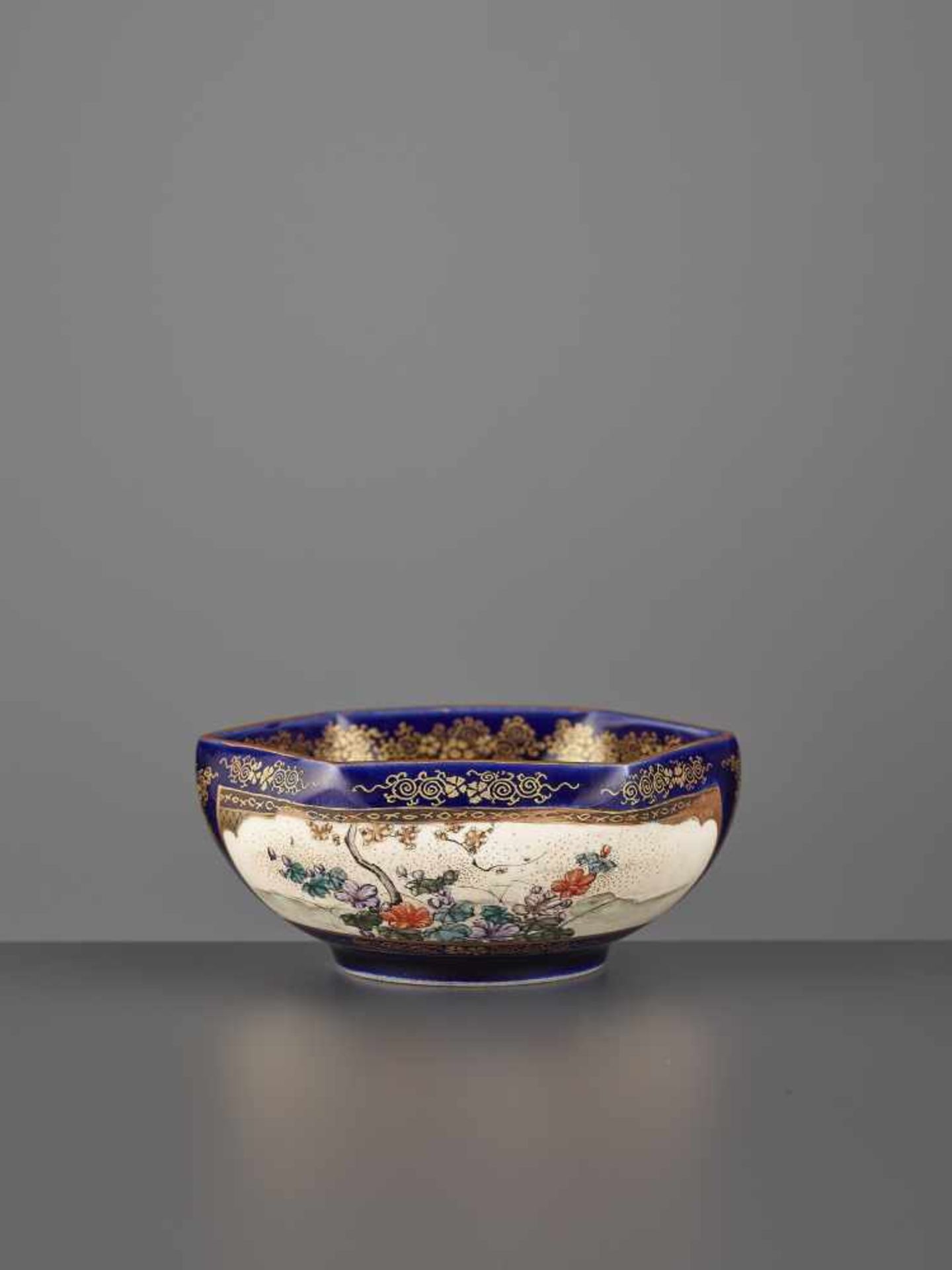 A ROYAL BLUE SEIZAN SATSUMA BOWL Japan, Meiji period (1868-1912). The hexagonal bowl bears a royal