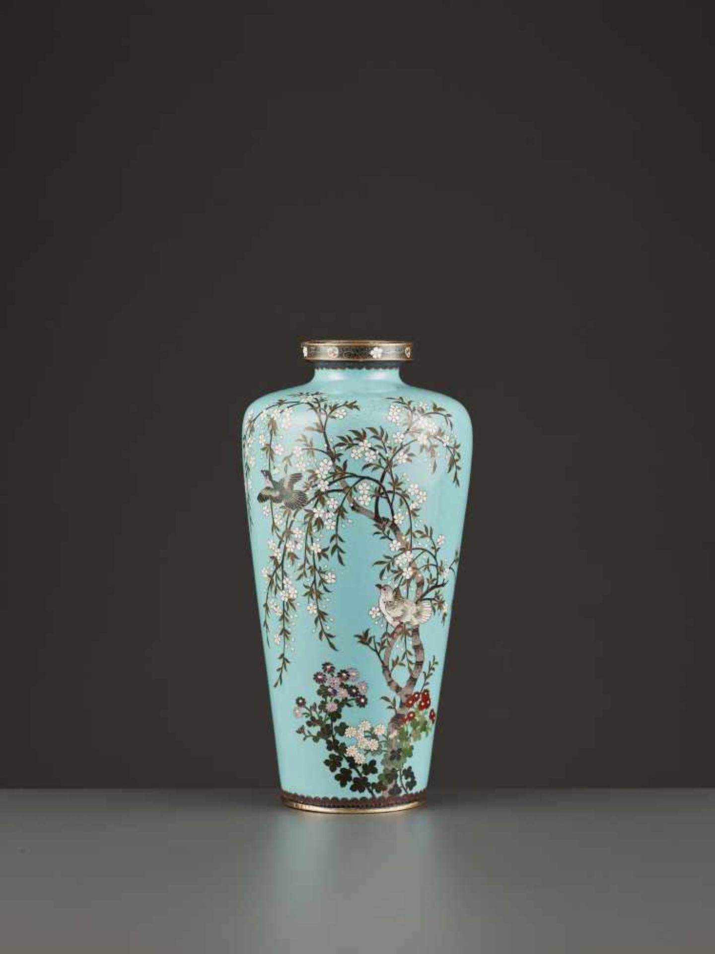 A HAYASHI CHUZO CLOISONNÉ VASE Japan, Meiji period (1868-1912). The baluster vase decorated in