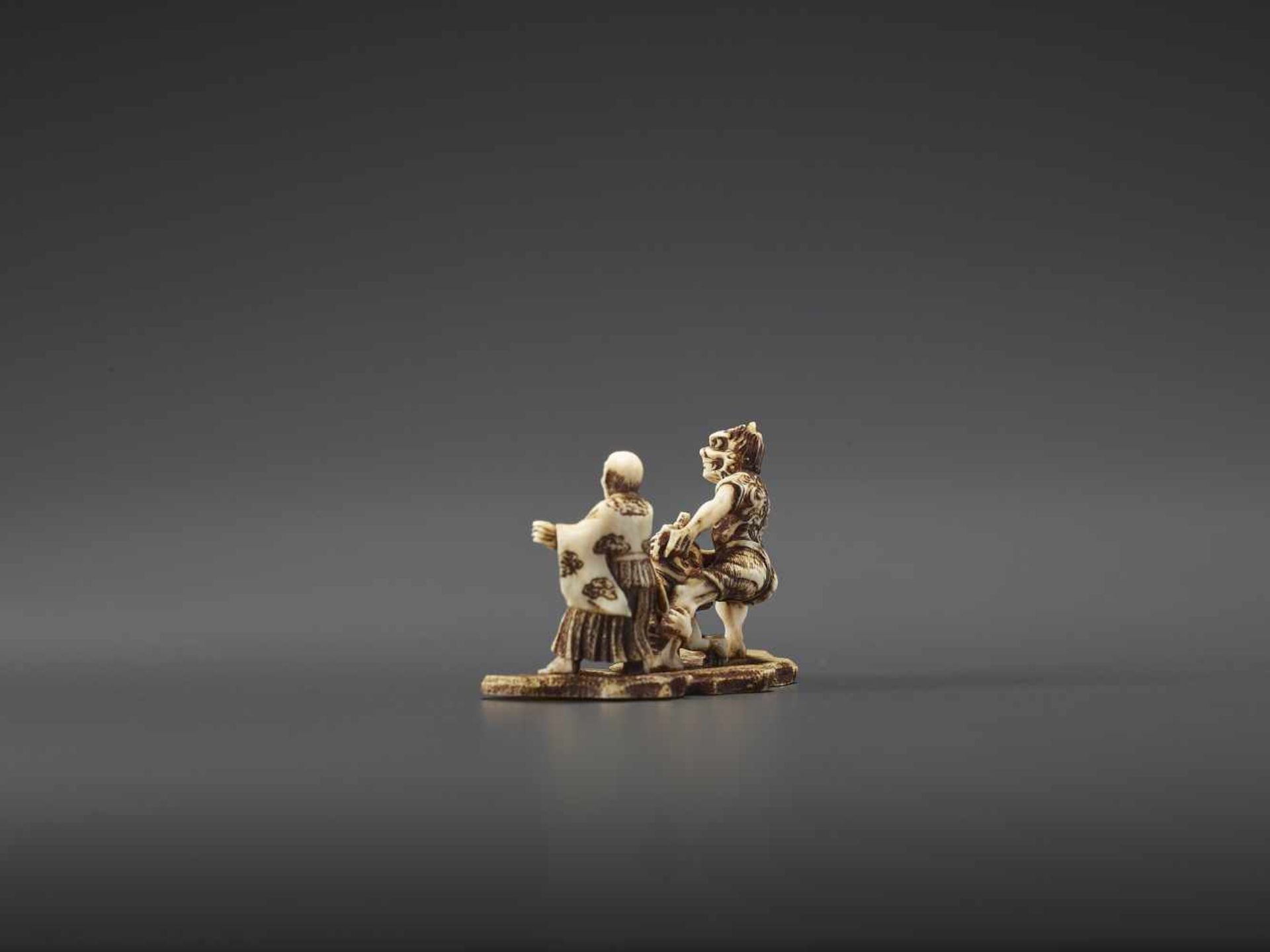 A MINUTELY CARVED IVORY NETSUKE OF ONI, KAPPA AND MONK SIGNED TENMIN Signed Tenmin, ivory - Image 4 of 10