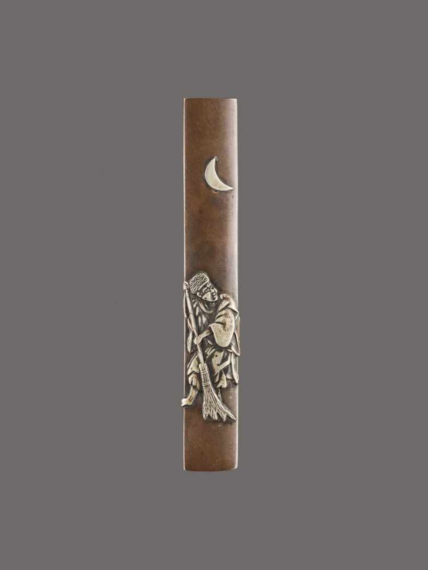 A SENTOKU AND SILVER KOZUKA HANDLE DEPICTING A MAN WITH A BROOM UNDER THE CRESCENT MOON Unsigned,