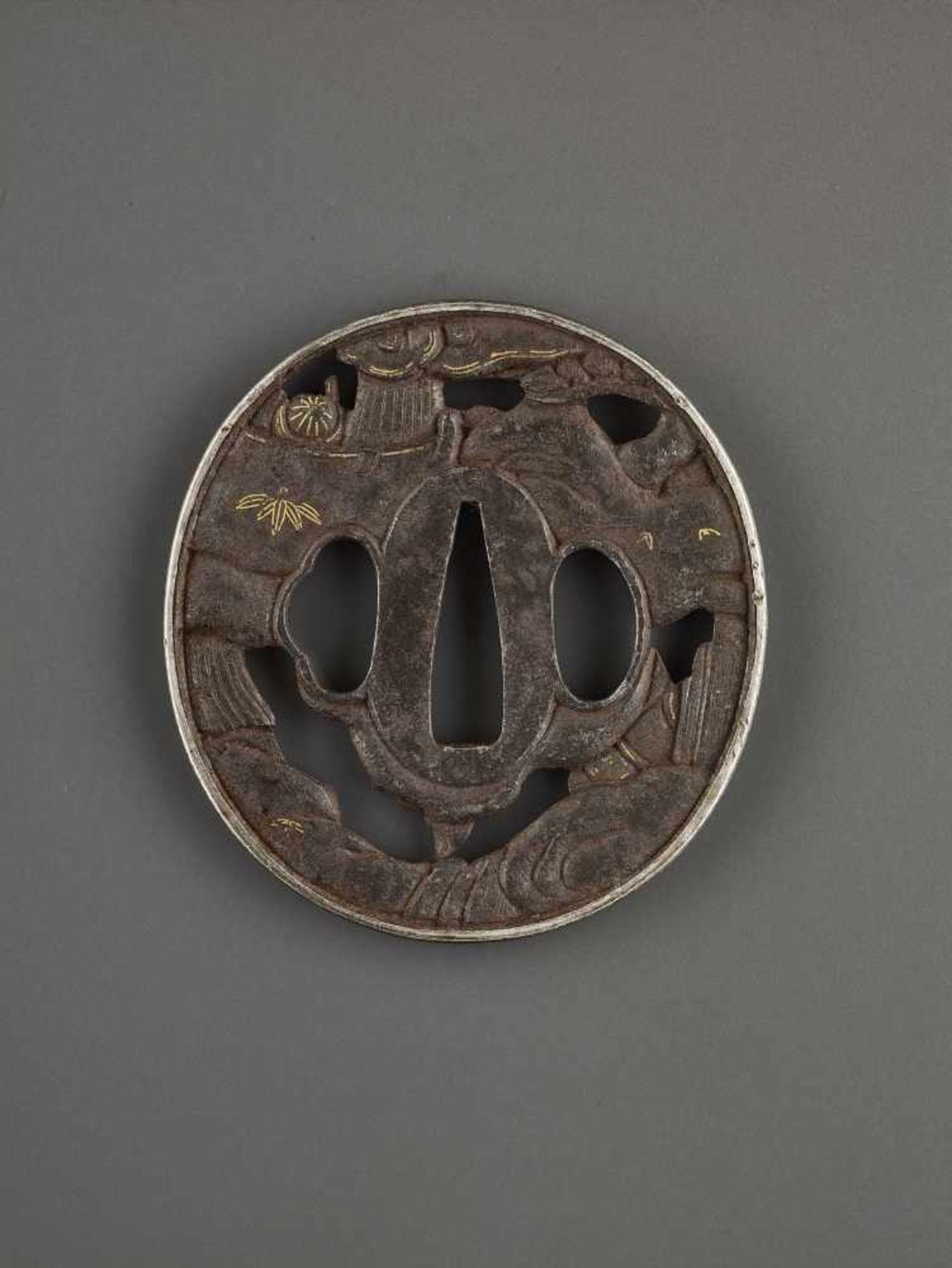 AN IRON, COPPER AND GOLD TSUBA DEPICTING SAMURAI WARRIORS AMID ROCKS BY GENKO By Genko, tsuba, iron, - Image 4 of 4