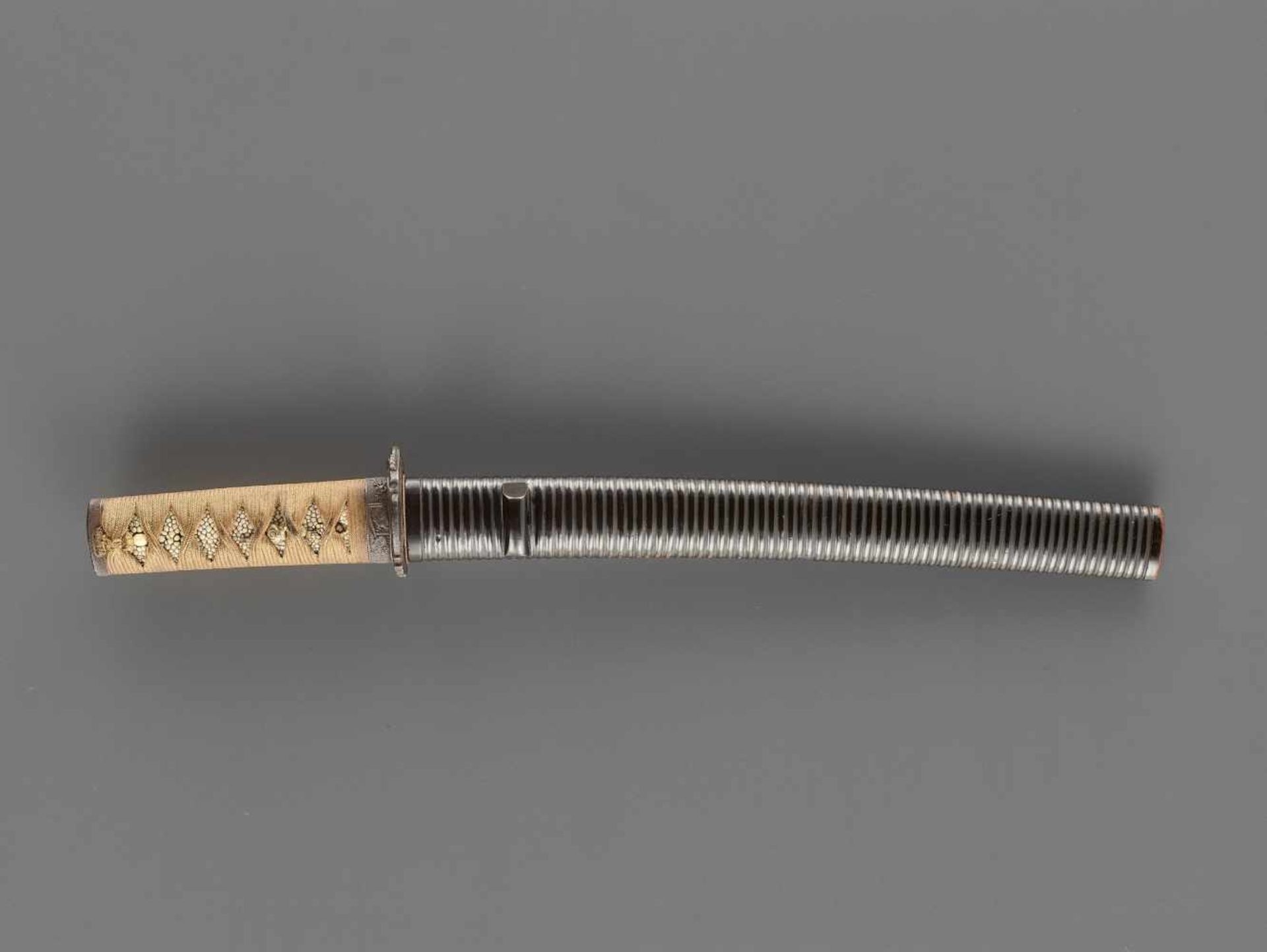 A TANTO IN KOSHIRAE Japan, c. mid-Edo period (1615-1868)The blade:Hirazukuri with iori mune, the