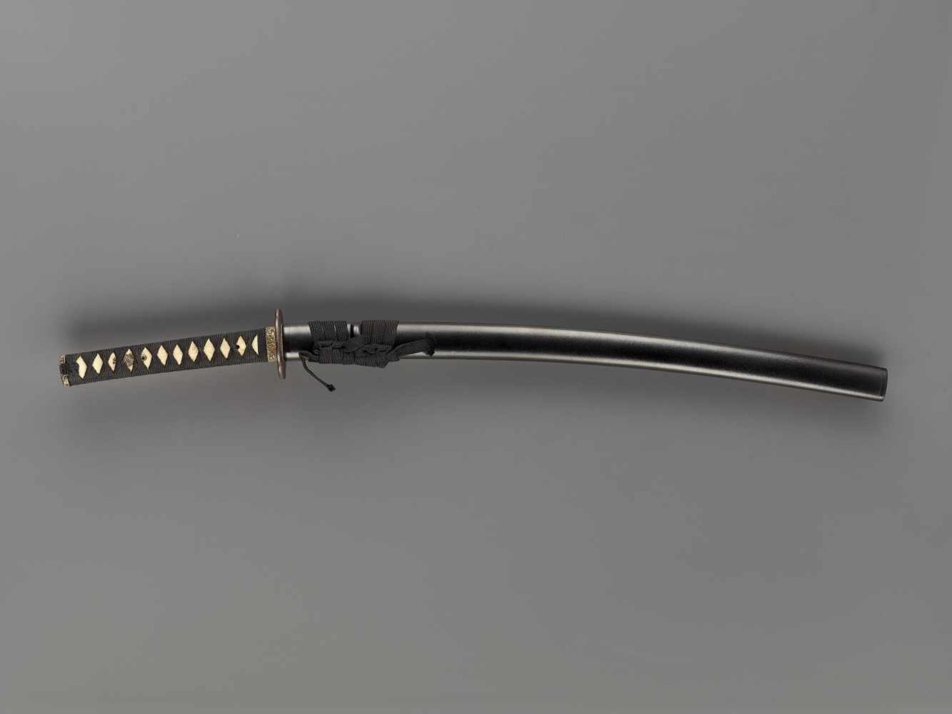 A WAKIZASHI IN KOSHIRAE Japan, c. 18th century, Edo period (1615-1868)The blade:The blade’s shape is