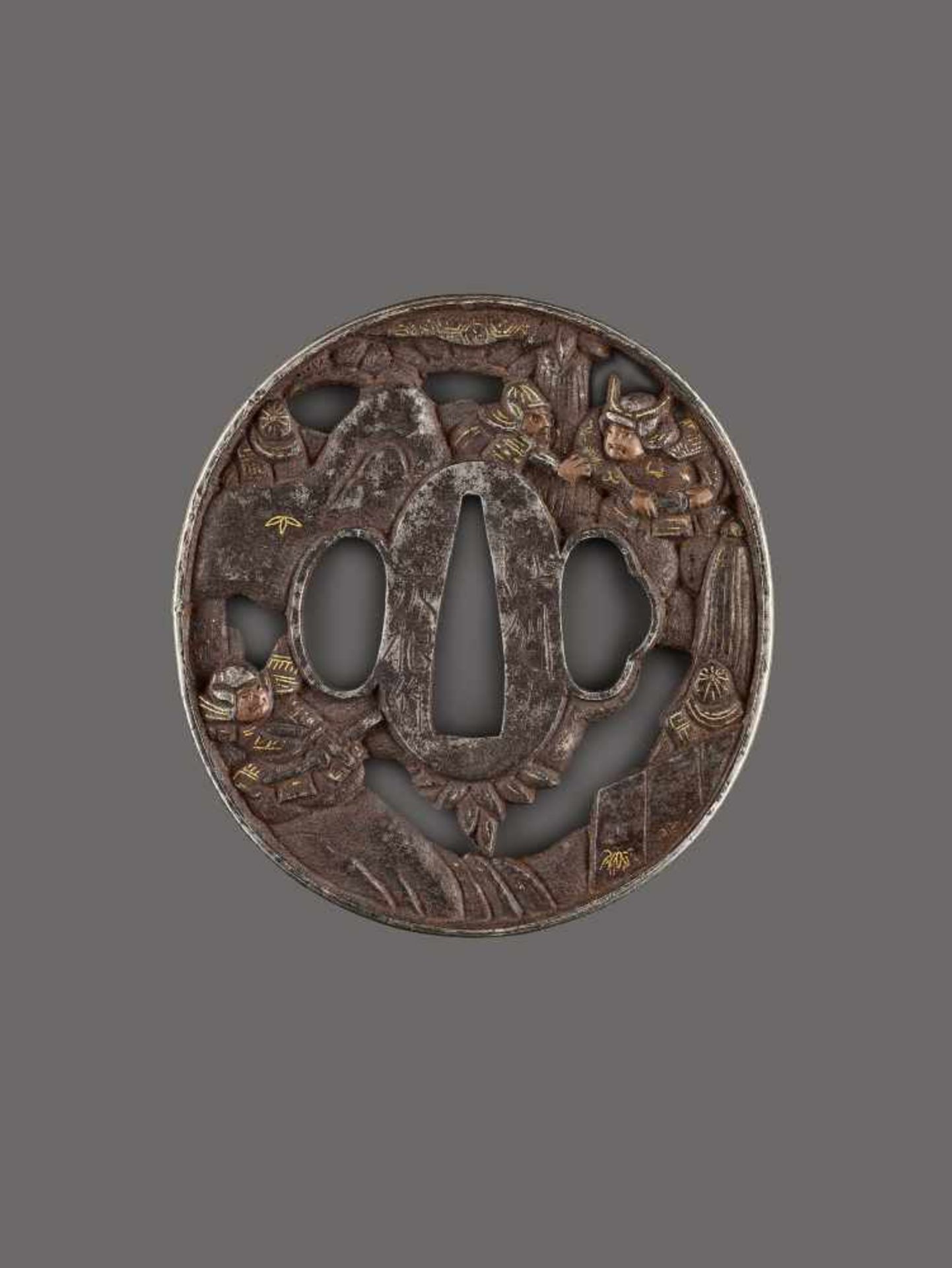 AN IRON, COPPER AND GOLD TSUBA DEPICTING SAMURAI WARRIORS AMID ROCKS BY GENKO By Genko, tsuba, iron,