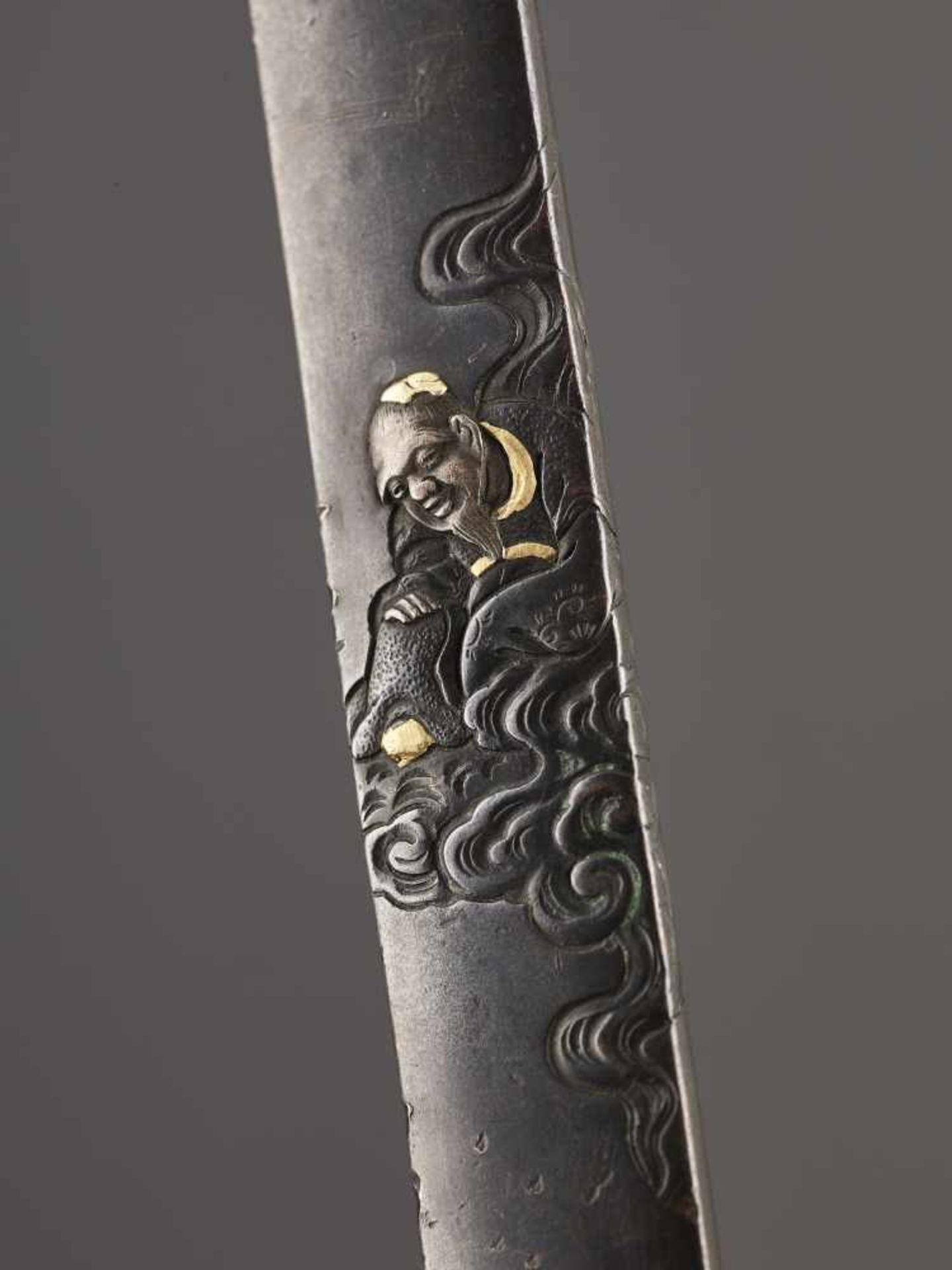 A SHAKUDO KOZUKA HANDLE OF A TAOIST MAGICIAN ON A CLOUD BY KATSUYUKI By Terumitsu, kozuka handle, - Image 3 of 4