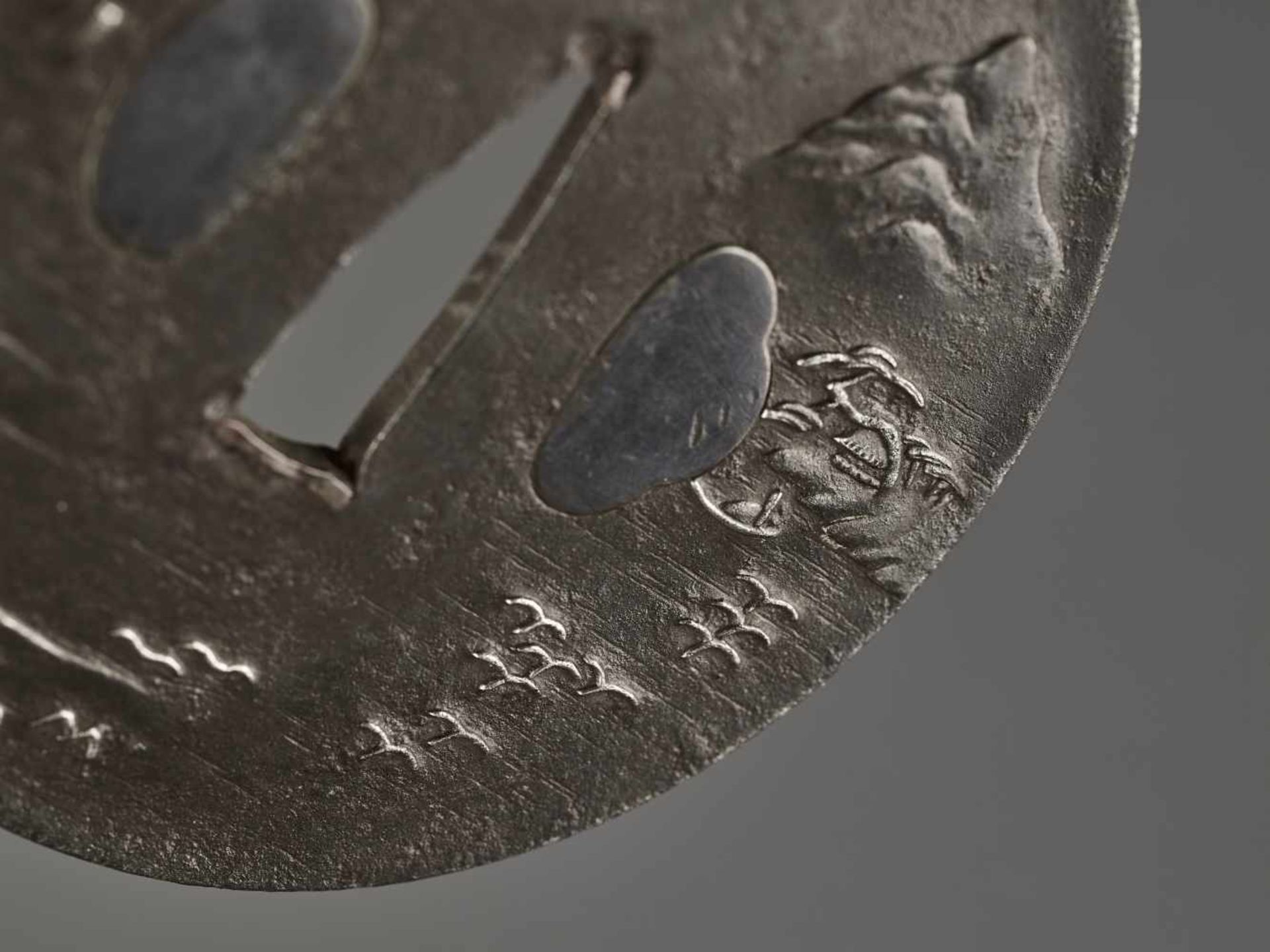 A FINE IRON TSUBA Unsigned, Iron with silver and shakudoJapan, Edo period (1615-1868)Of Naga Maru - Image 2 of 4