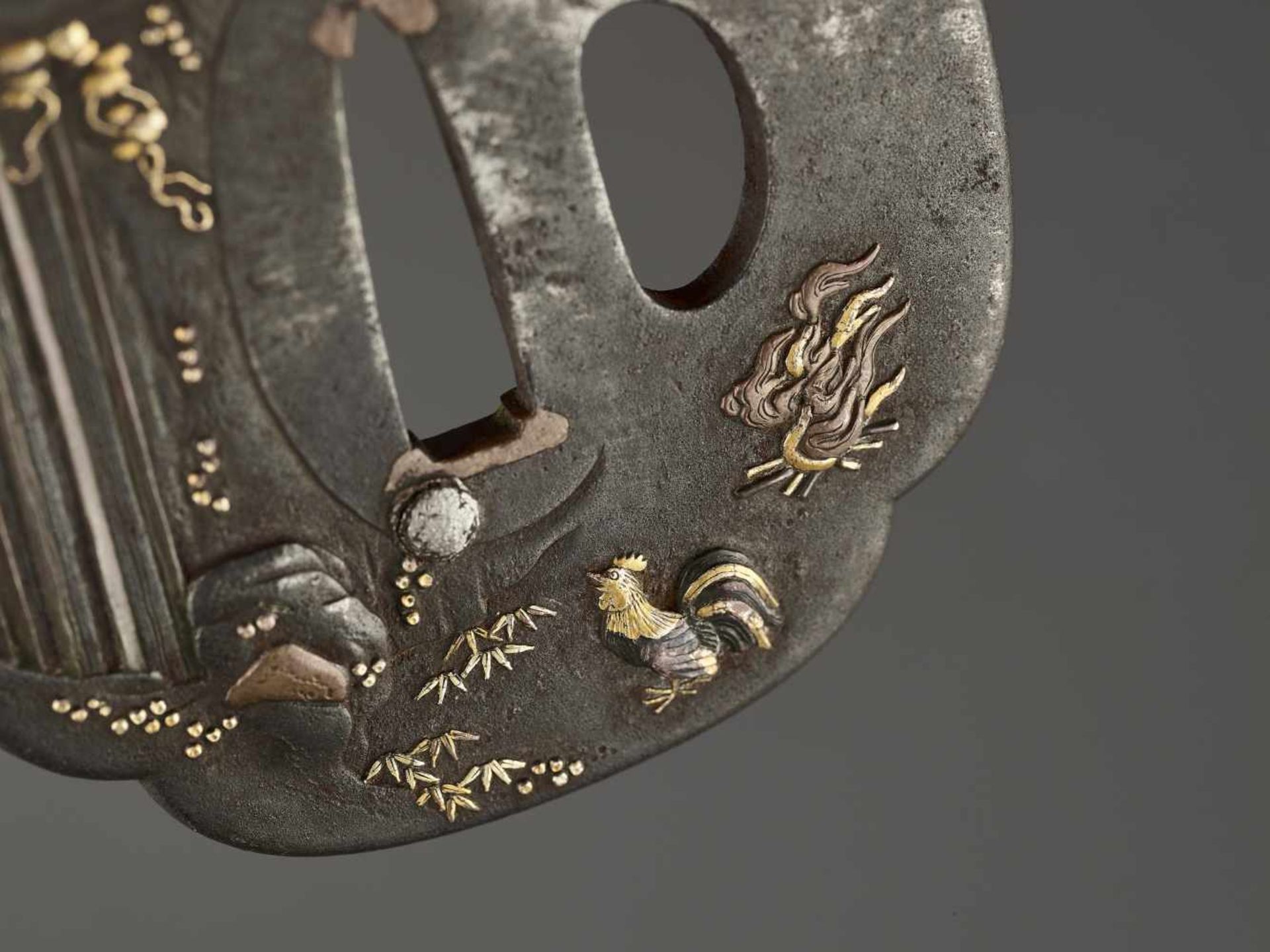 AN IRON, COPPER AND GOLD TSUBA DEPICTING FUDO AND COMPANION Unsigned, tsuba, iron, copper and gold - Image 4 of 4