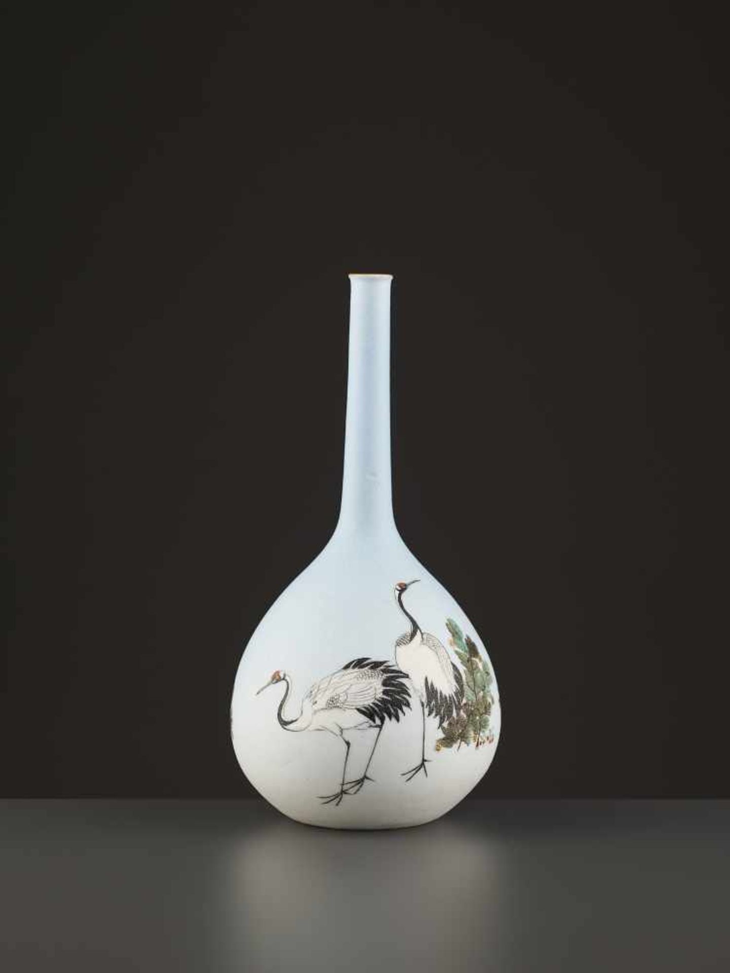 A TAKEUCHI CHUBEI BOTTLE VASE Japan, Meiji period (1868-1912). Porcelain with a shark skin glaze and