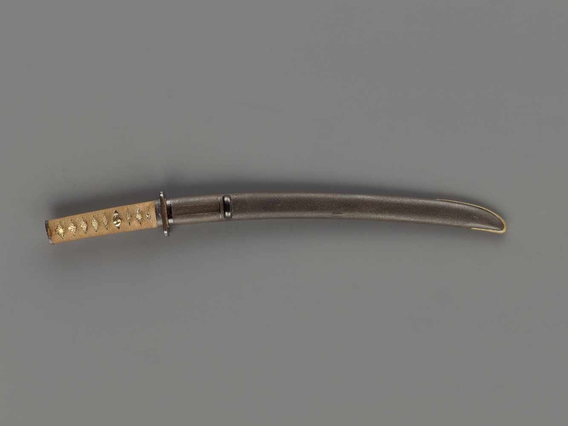 A WAKIZASHI IN KOSHIRAE Japan, late Edo period (1615-1868)The blade:The slender, relatively