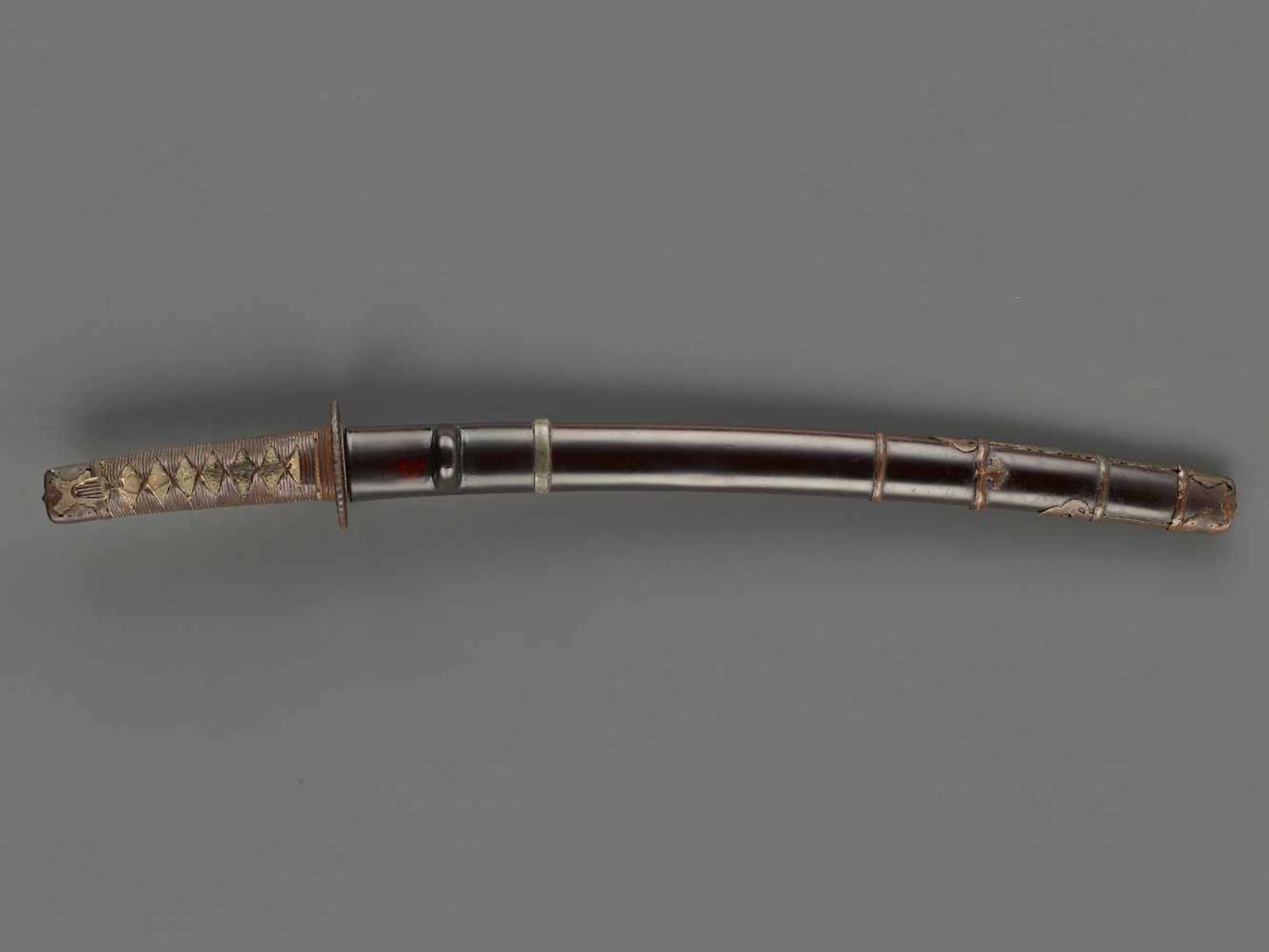 A WAKIZASHI IN KOSHIRAE Japan, c. 18th century, Edo period (1615-1868)The blade:The form which