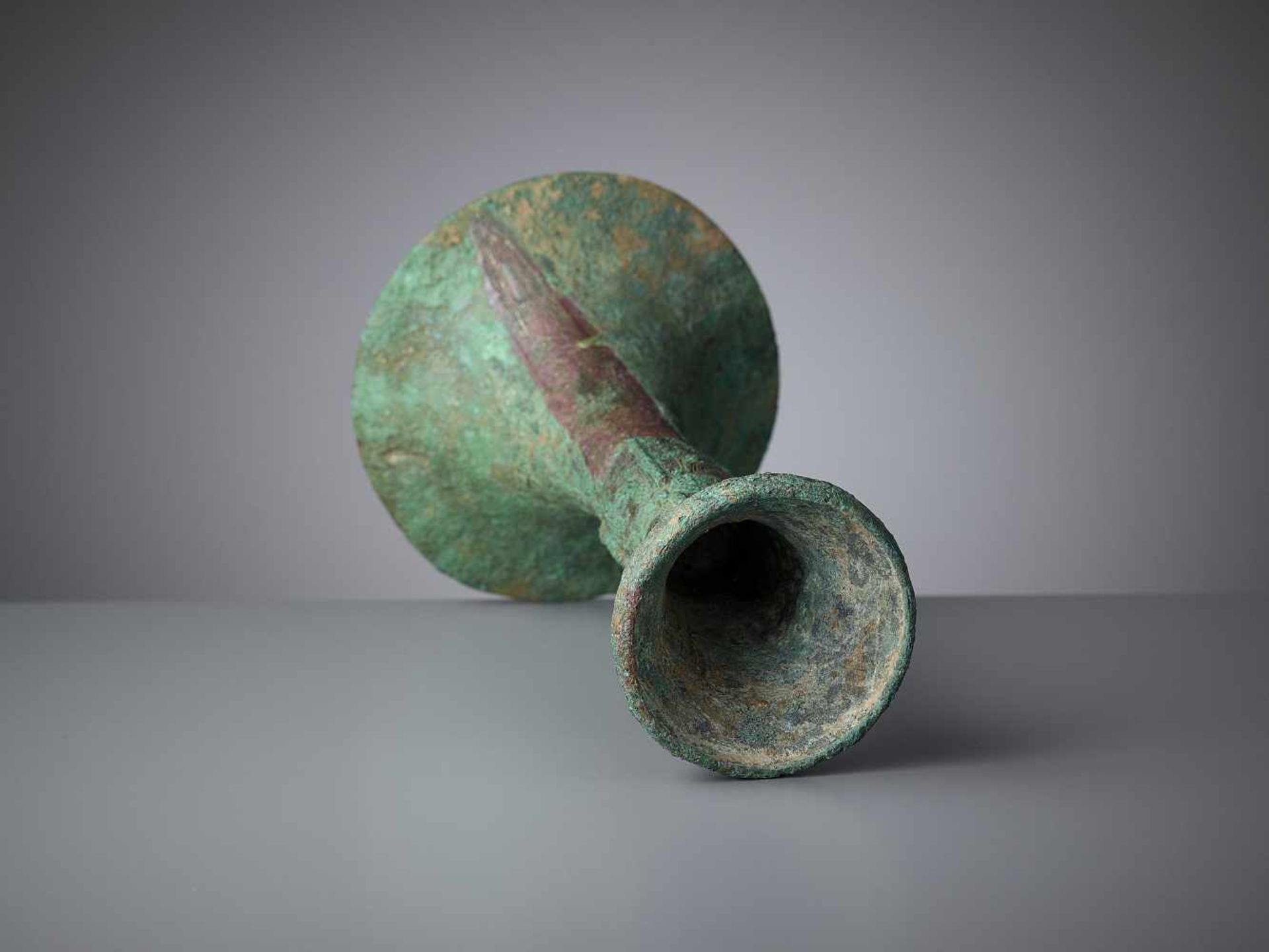 A BRONZE RITUAL WINE VESSEL, GU, SHANG DYNASTY China, late Shang dynasty, 13th-11th century BC. - Image 9 of 12