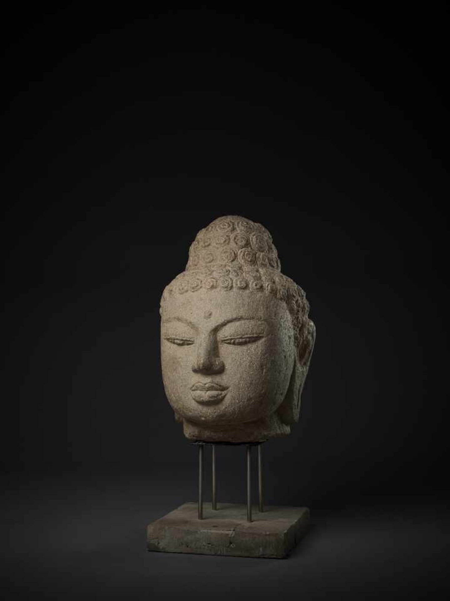 A LARGE AND IMPORTANT ANDESITE HEAD OF BUDDHA Indonesia, Central Java, 9th-10th century. Finely - Image 3 of 9
