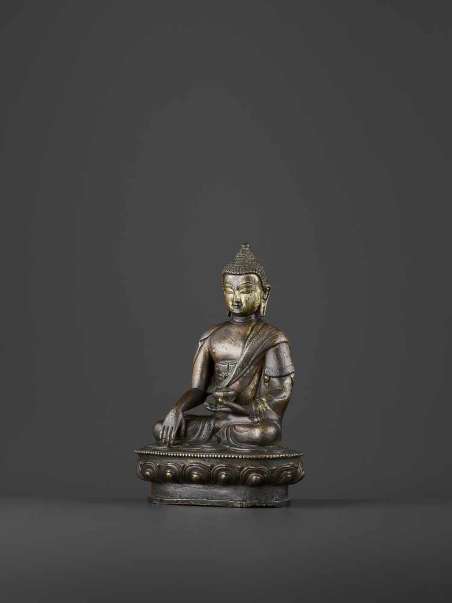 A BRONZE BUDDHA SHAKYMUNI, QING China, 18th century. The figure seated on a beaded lotus base in - Image 2 of 8