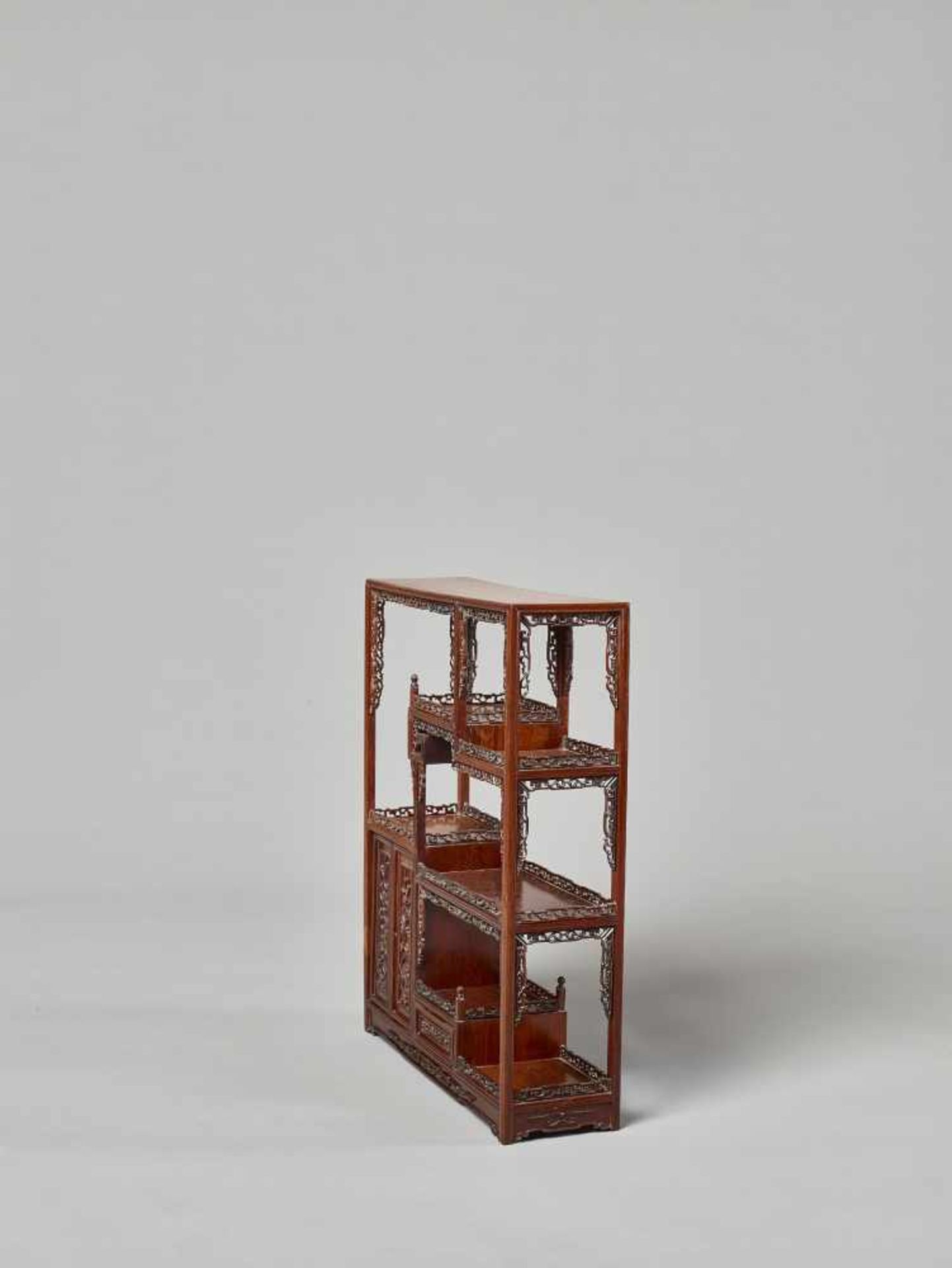 A HARDWOOD DISPLAY TABLE-CABINET, LATE QING DYNASTY China, 19th – earlier 20th century. The wood - Image 4 of 8