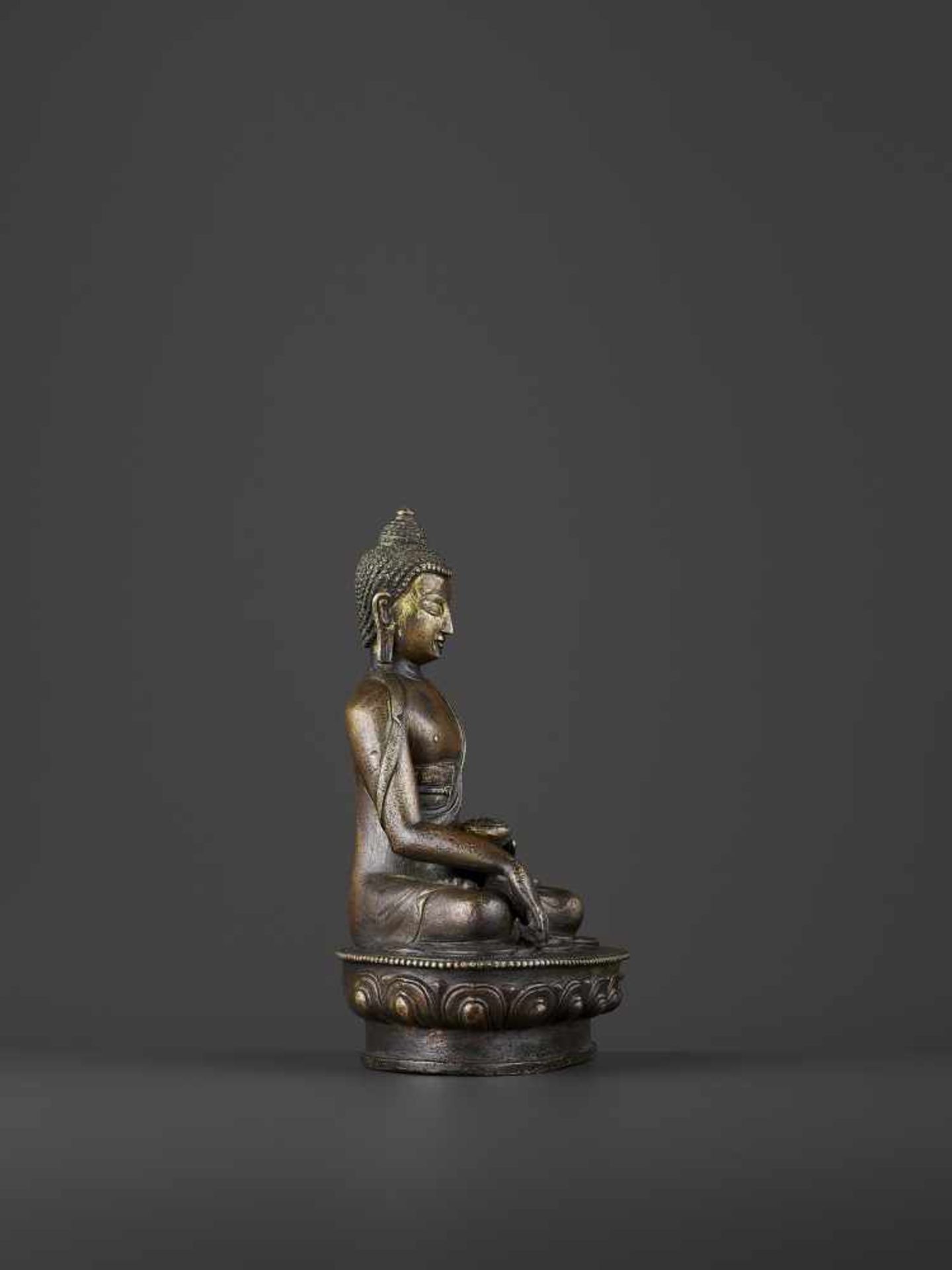 A BRONZE BUDDHA SHAKYMUNI, QING China, 18th century. The figure seated on a beaded lotus base in - Image 5 of 8