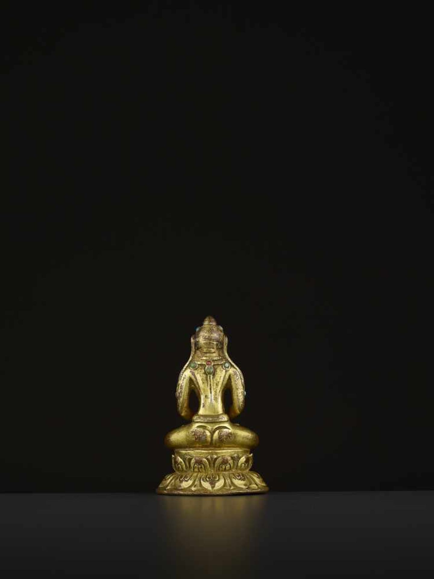 A GILT BRONZE MAHASIDDHA VIRUPA, 16TH CENTURY Tibet. Seated in dhyanasana on a double lotus base, - Image 5 of 11