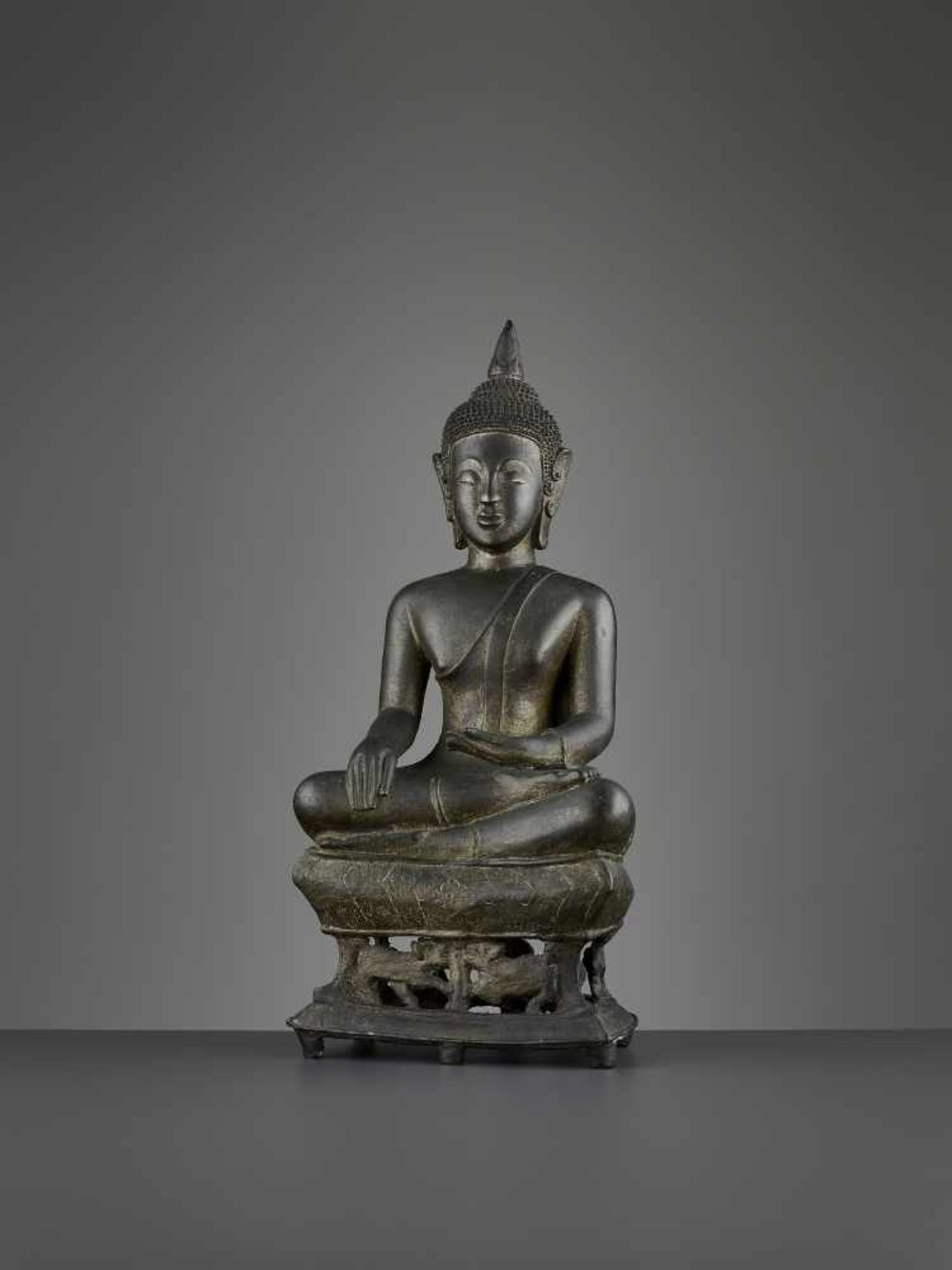 A BUDDHA SHAKYAMUNI BRONZE, LAOS Laos or Northern Thailand, 17th century. The massively cast - Image 2 of 10