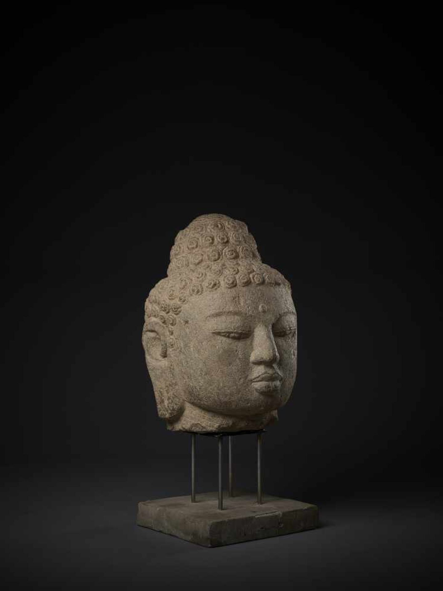 A LARGE AND IMPORTANT ANDESITE HEAD OF BUDDHA Indonesia, Central Java, 9th-10th century. Finely - Image 7 of 9