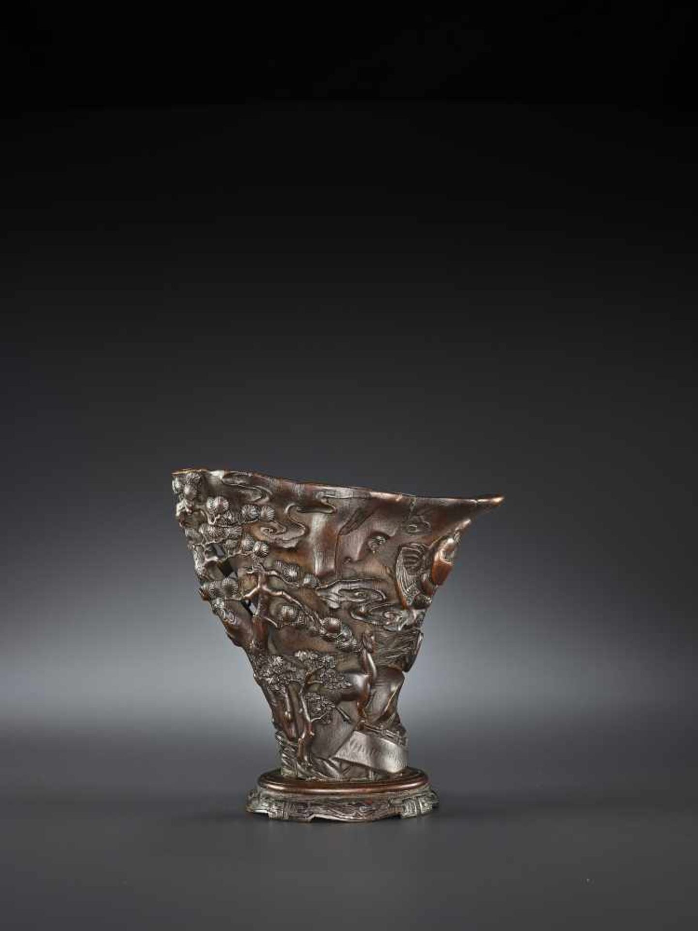 A LARGE RHINOCEROS HORN LIBATION CUP China, 17th – early 18th century. Finely carved in high - Image 11 of 17