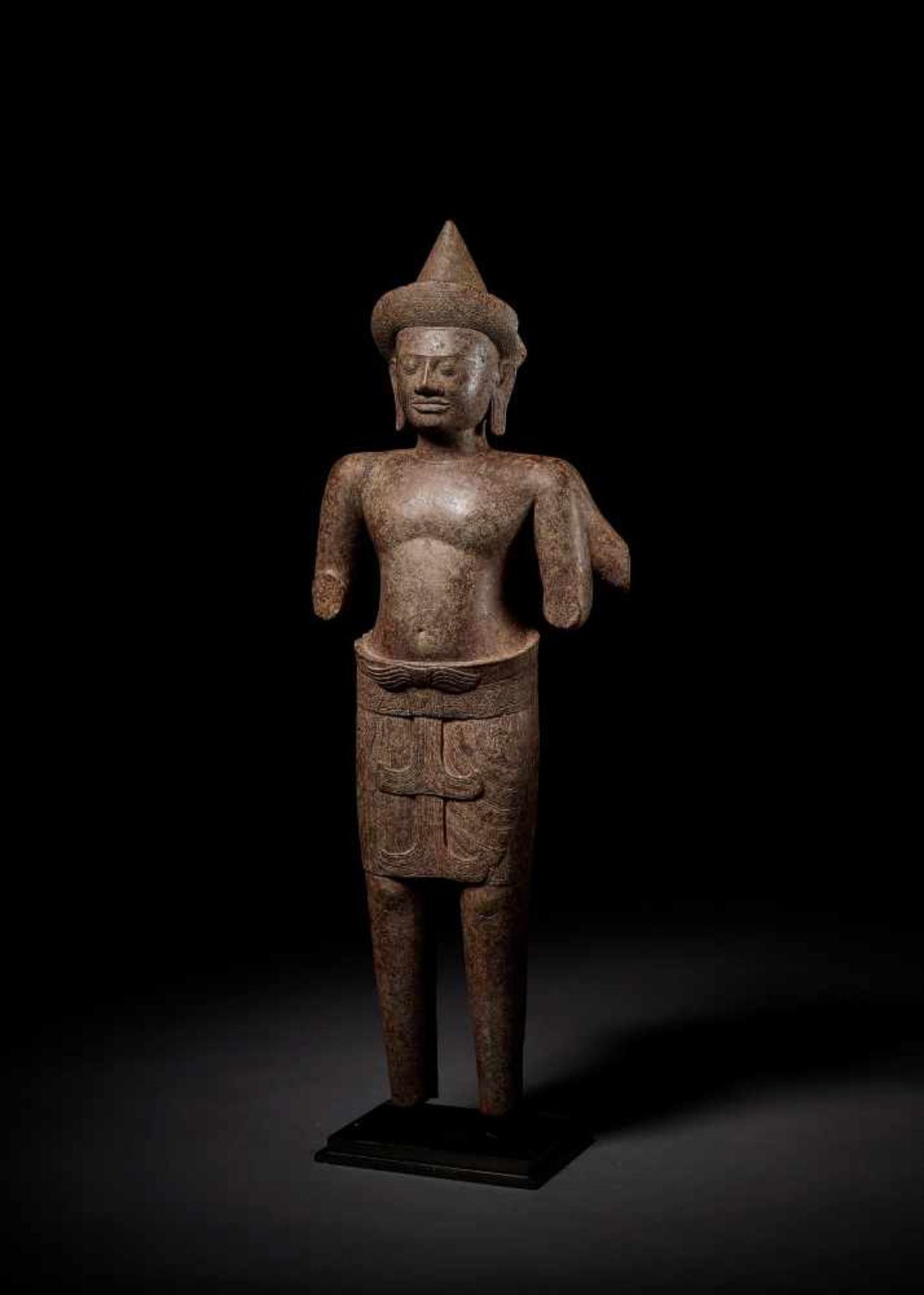 A SANDSTONE FIGURE OF VISHNU, ANGKOR PERIOD Cambodia, Khmer style of Angkor Vat, Ca. Mid-12th